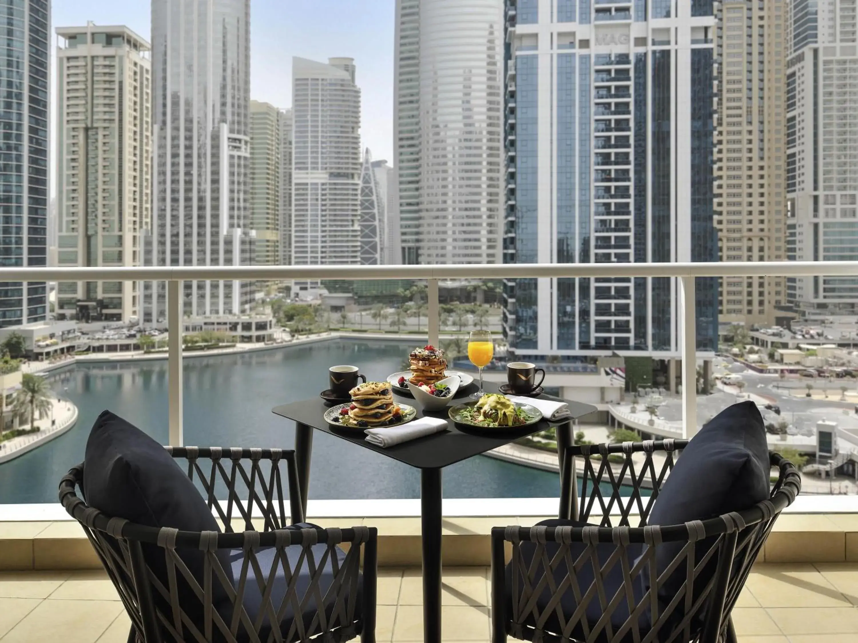 Property building in Mövenpick Hotel Jumeirah Lakes Towers Dubai Property building in Mövenpick Hotel Jumeirah Lakes Towers Dubai