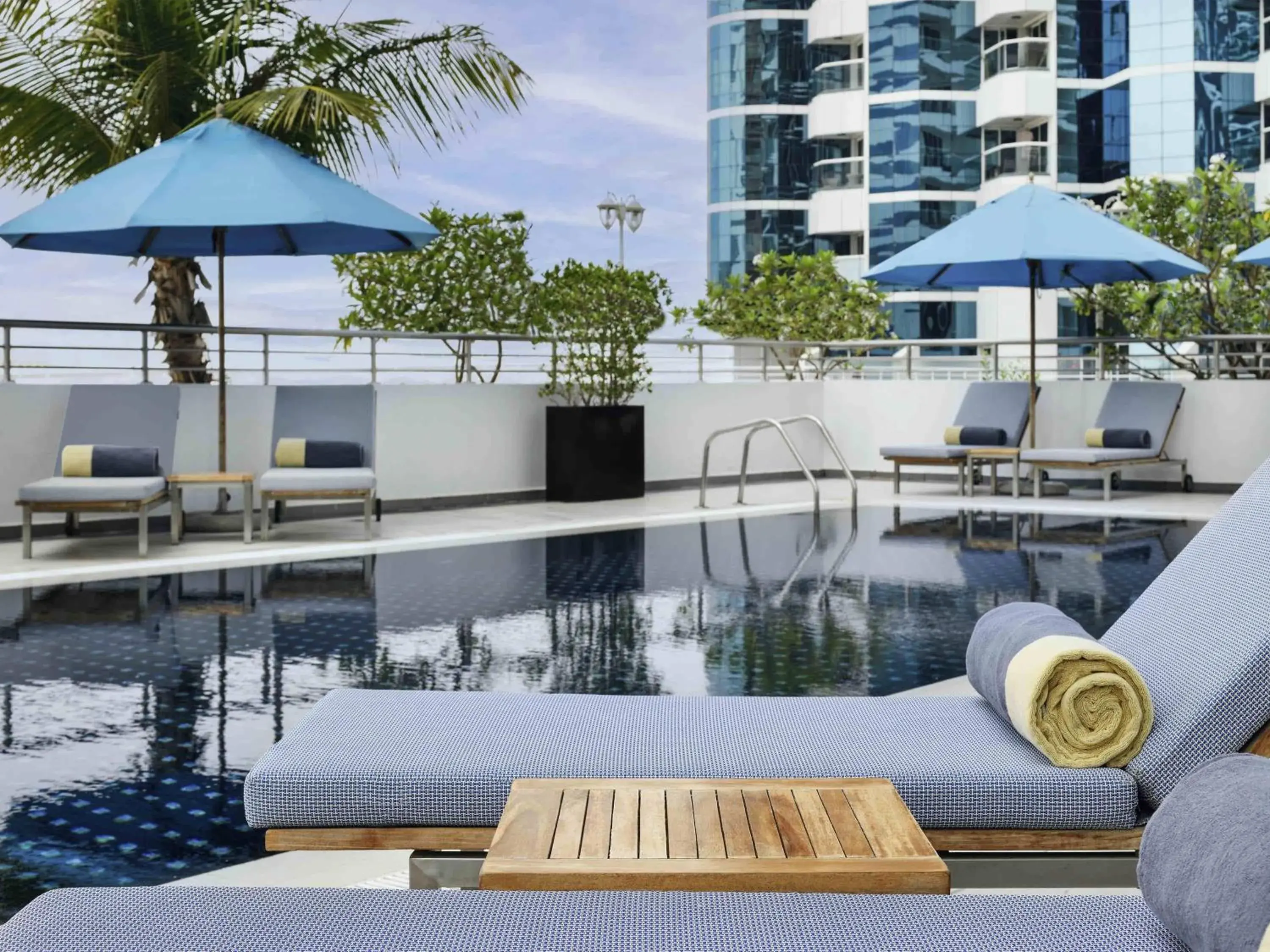 Pool view in Mövenpick Hotel Jumeirah Lakes Towers Dubai Pool view in Mövenpick Hotel Jumeirah Lakes Towers Dubai