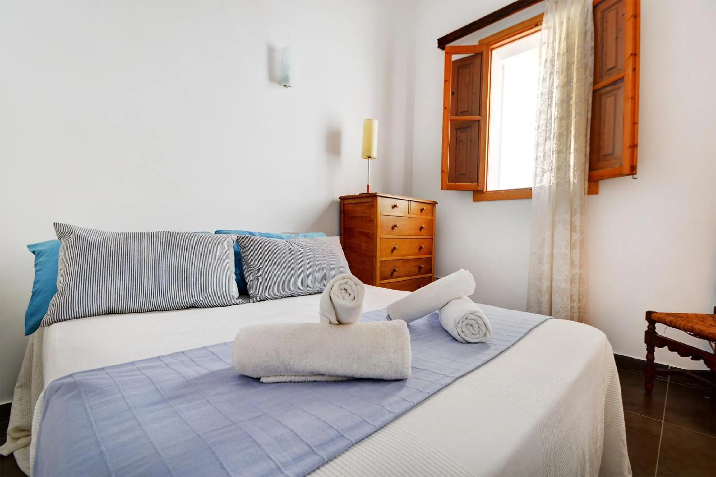 Bed in Amilcar House by Slow Villas