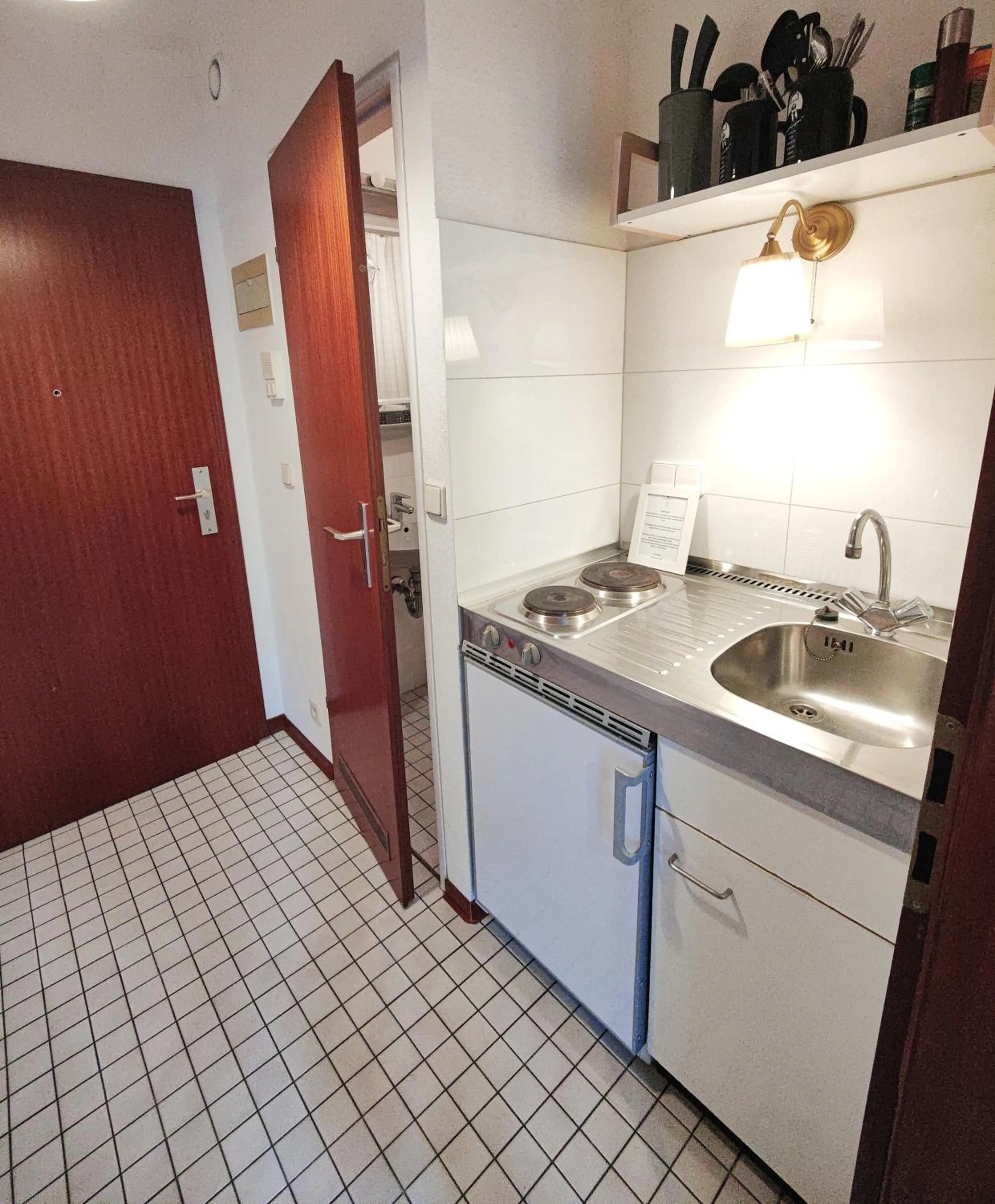 Kitchen or kitchenette in Hotel Beim Schupi Karlsruhe