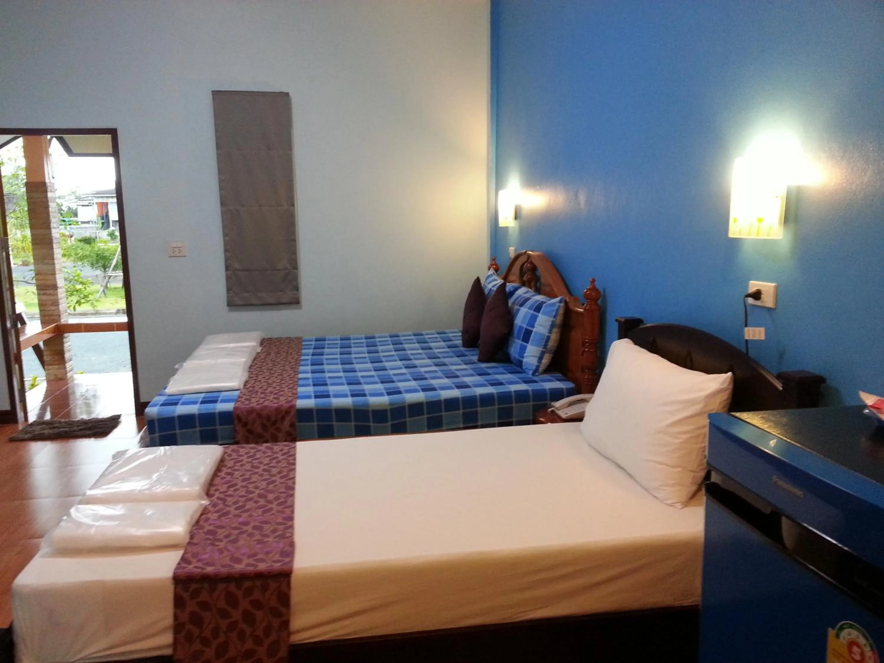 Bed in Sangtong Beach Resort