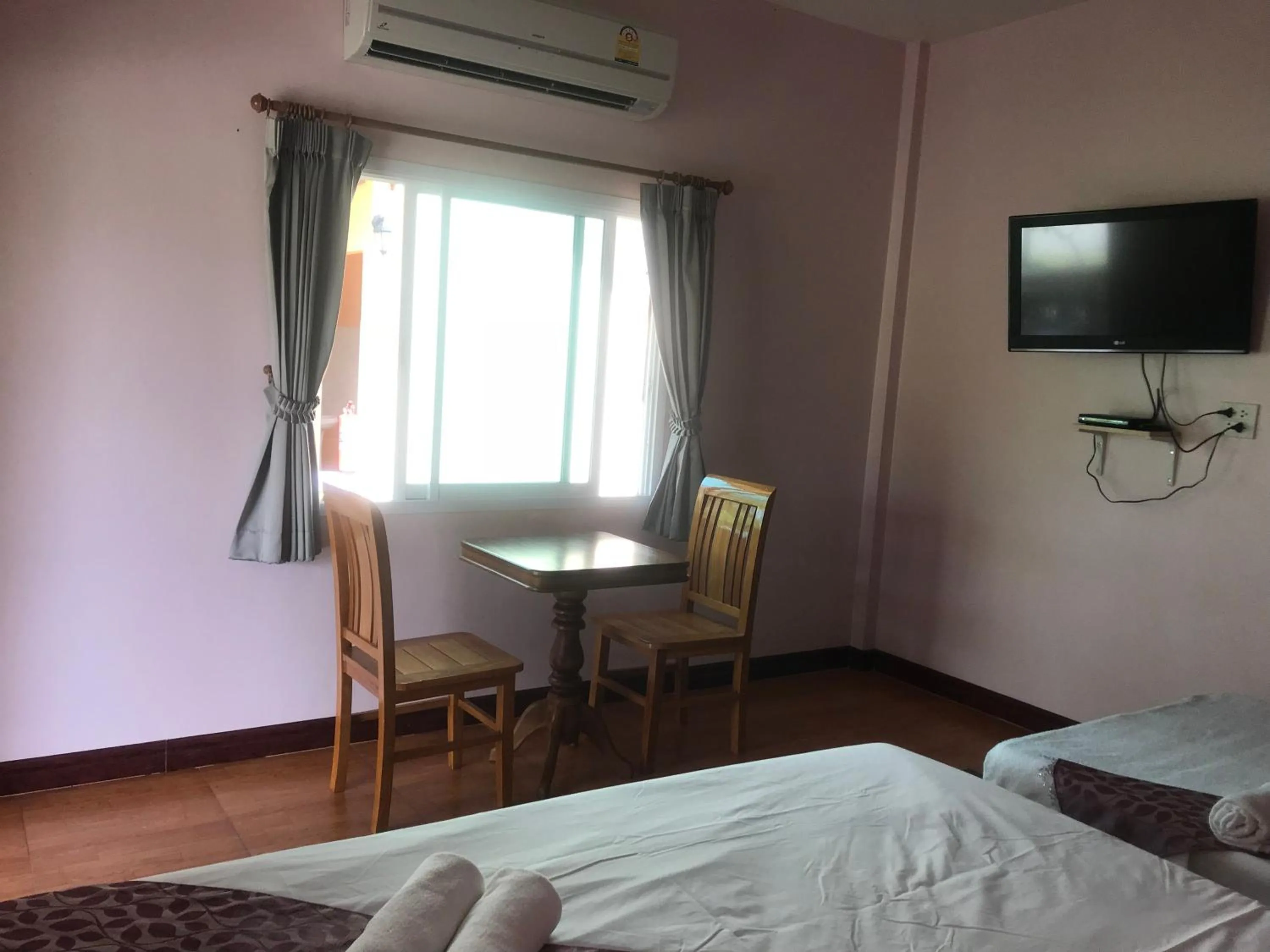 Bed in Sangtong Beach Resort