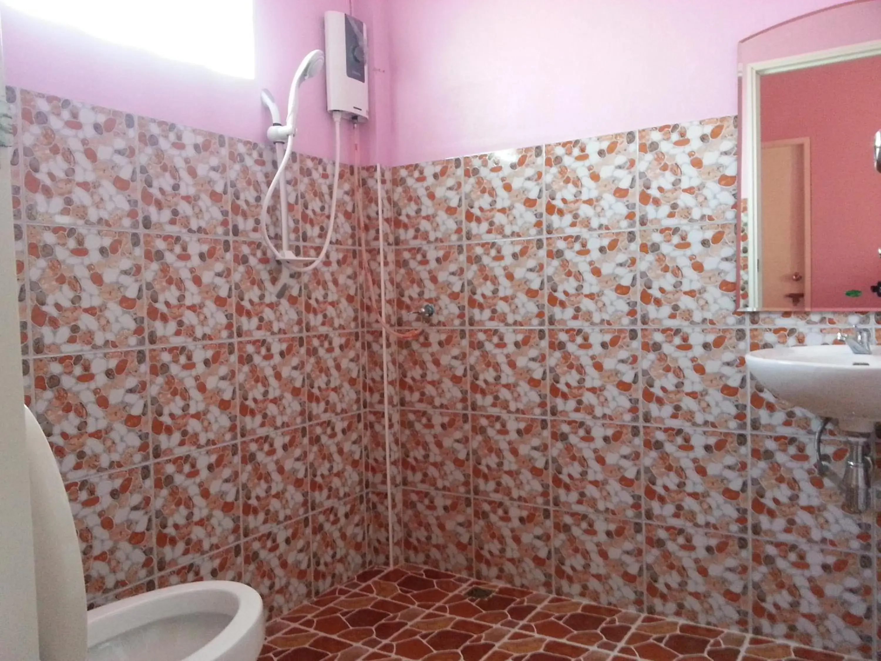 Bathroom in Sangtong Beach Resort Bathroom in Sangtong Beach Resort