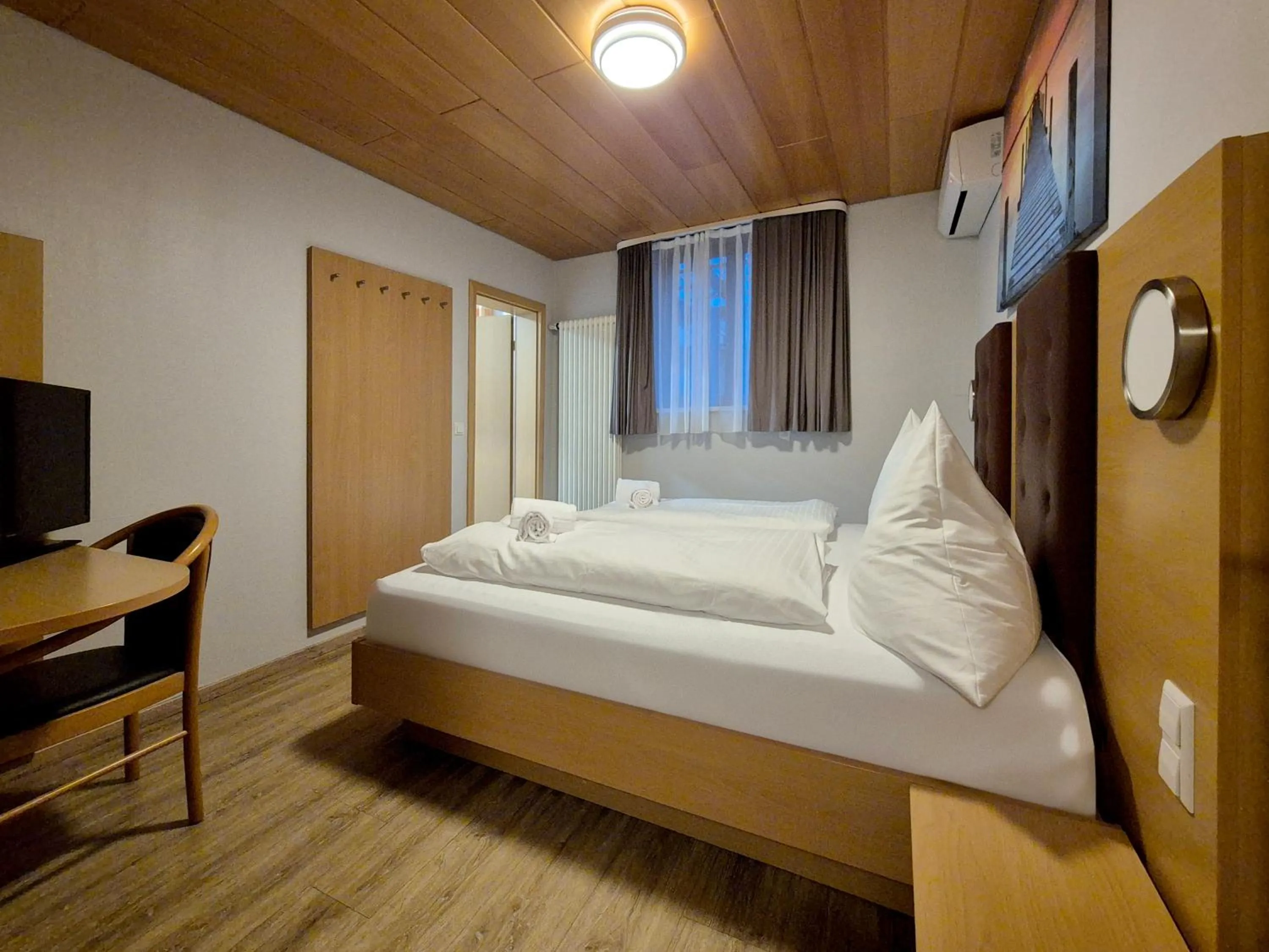 Bed in Hotel Mäuerle