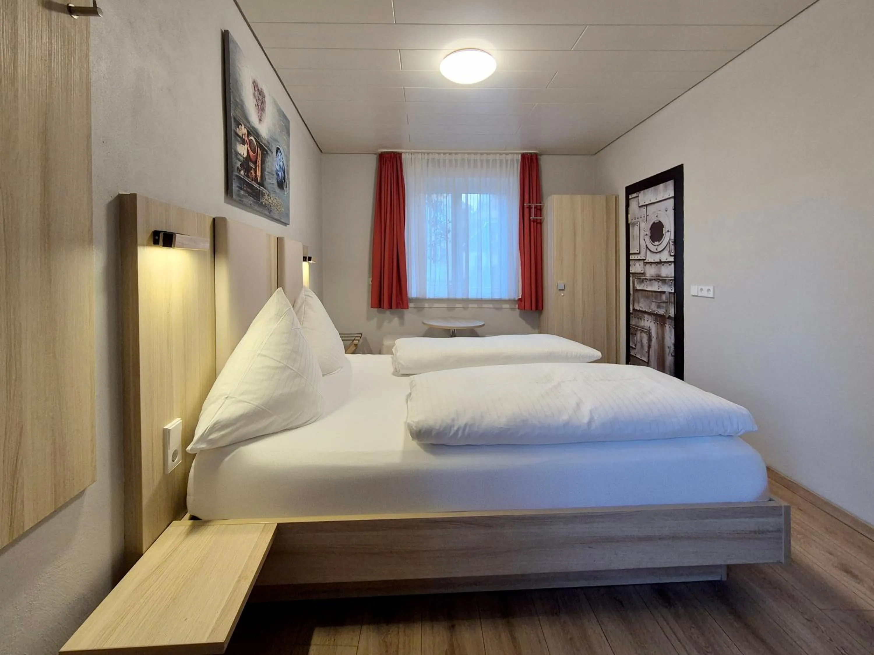 Bed in Hotel Mäuerle