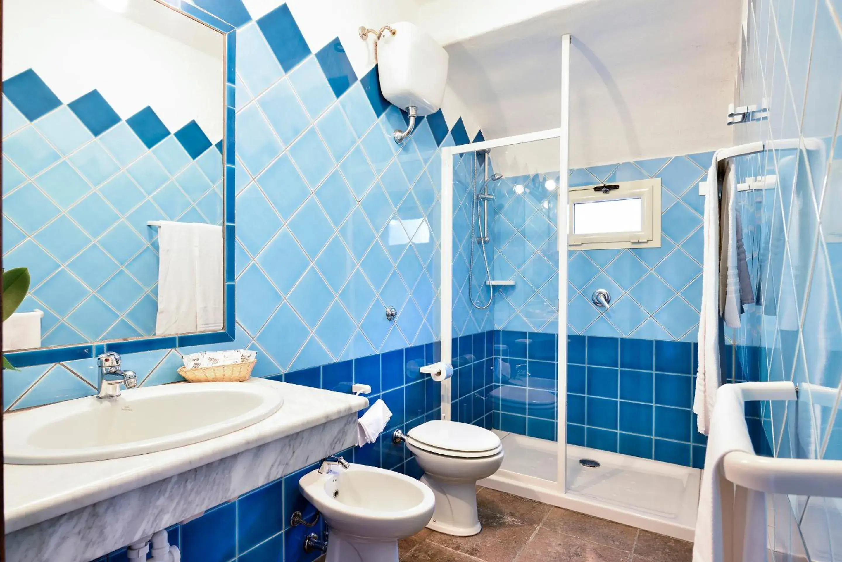 Bathroom in Arbatax Park Resort - Ville del Parco Bathroom in Arbatax Park Resort - Ville del Parco