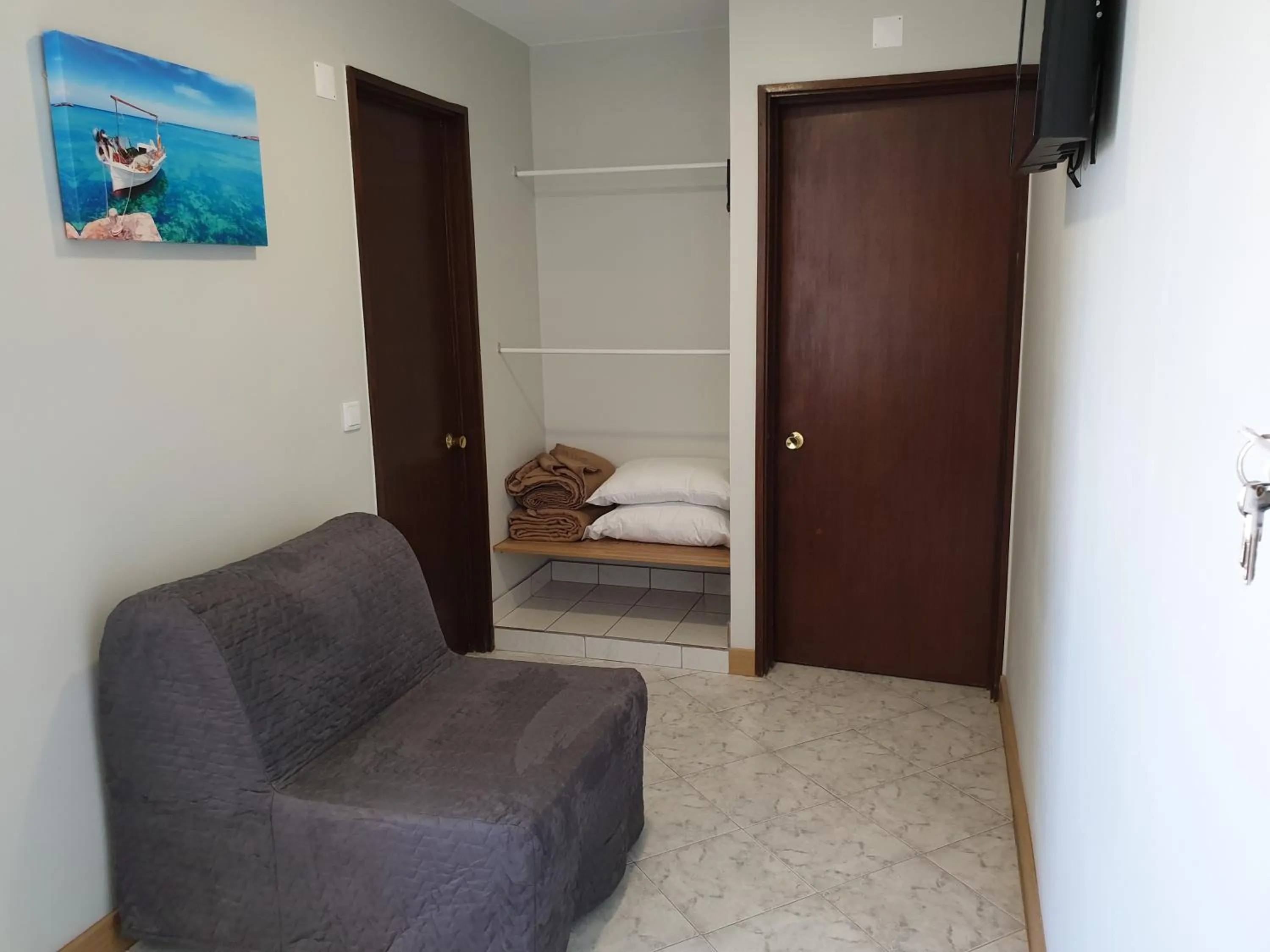 Living room, Bed in Tarik by Atlantichotels - AL