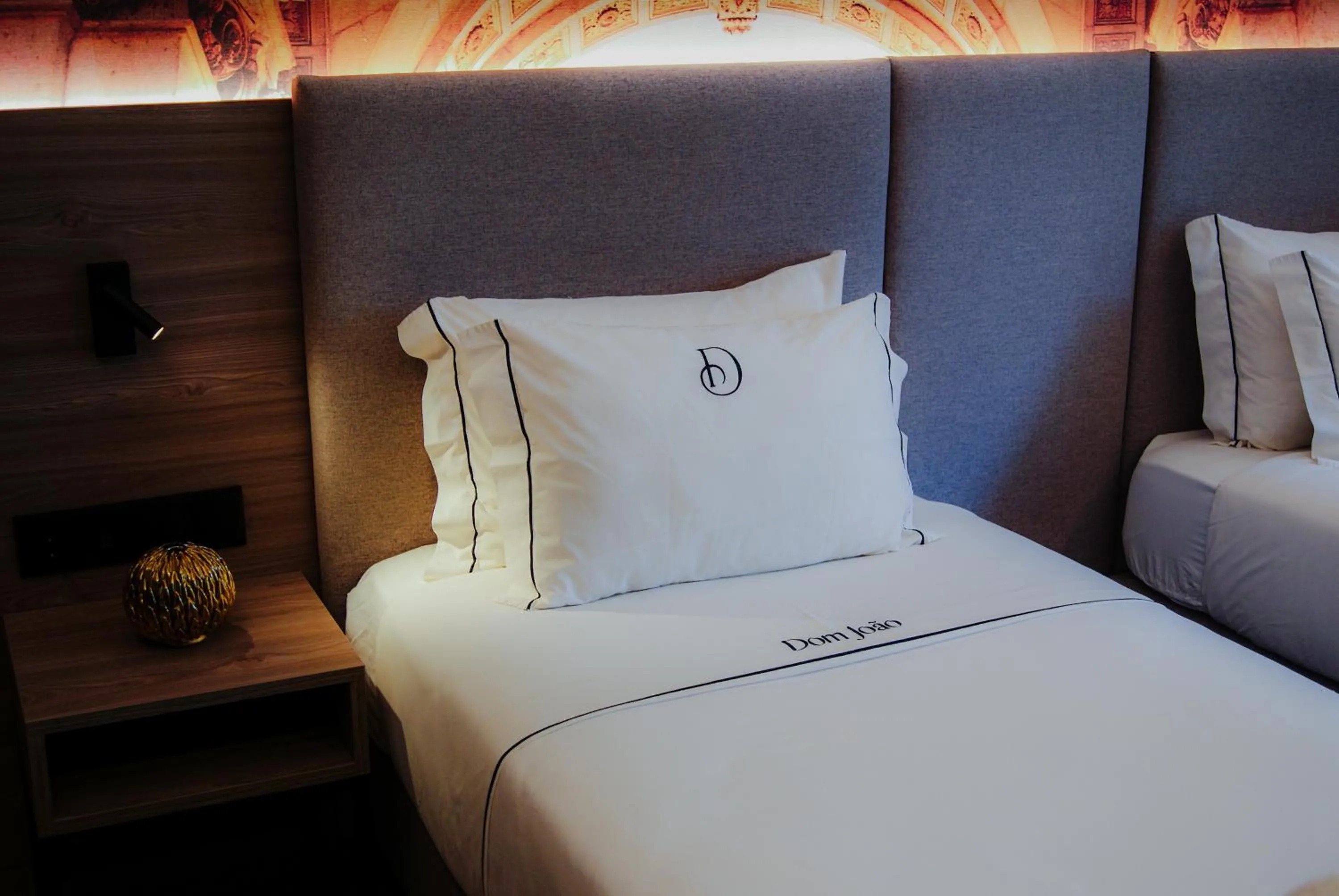 Bed in Dom João Glamour Hotel