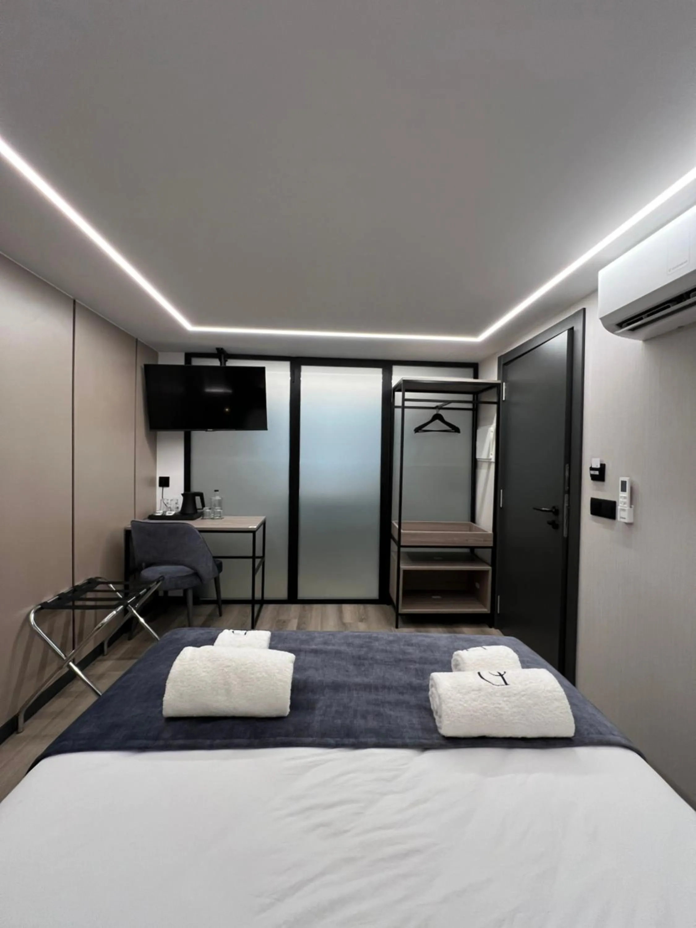 Bed in Dom João Glamour Hotel