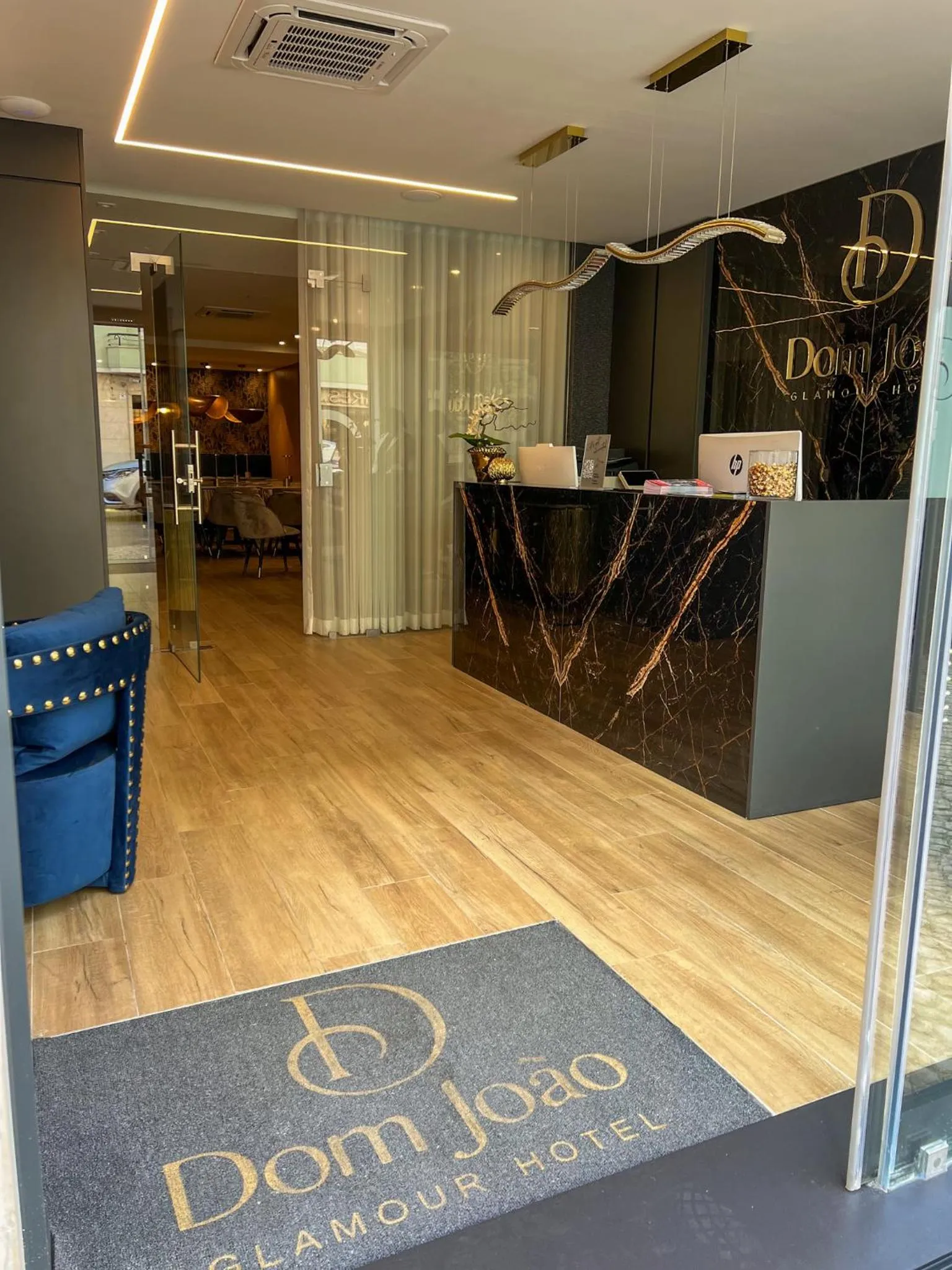 Lobby or reception in Dom João Glamour Hotel