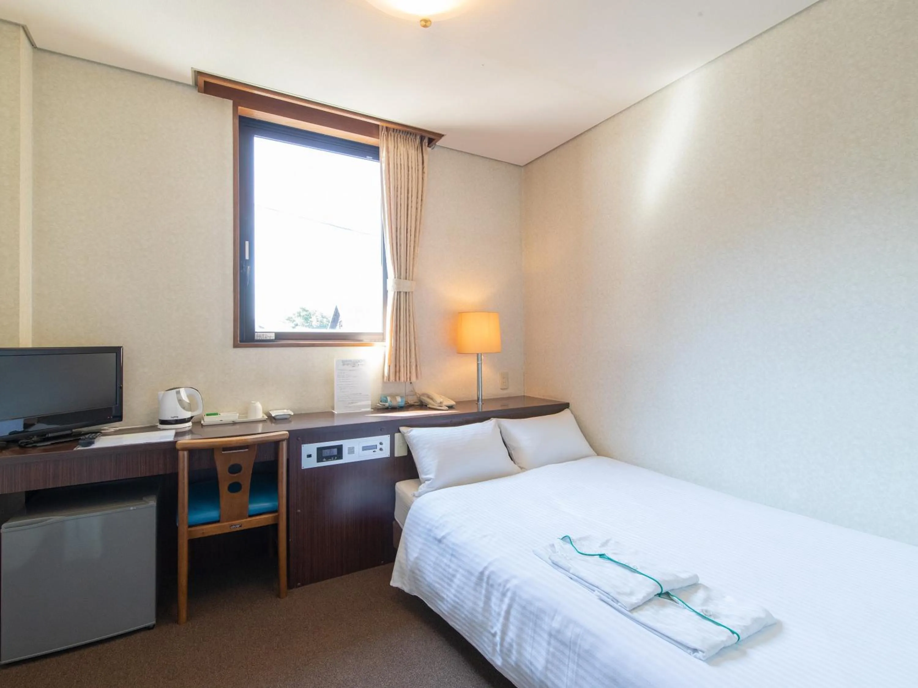 Photo of the whole room, Bed in Tabist Business Hotel Fujiya