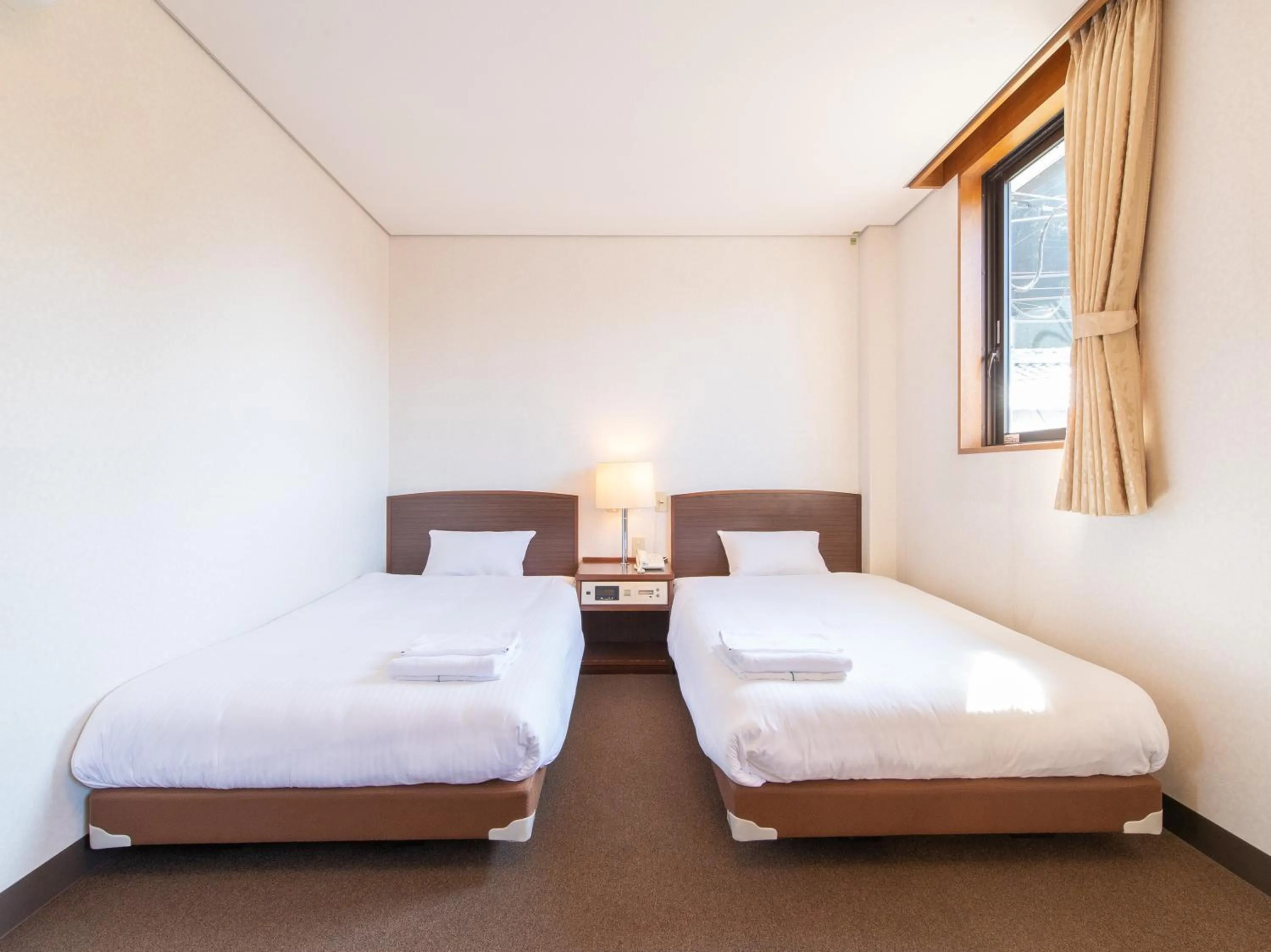 Photo of the whole room, Bed in Tabist Business Hotel Fujiya