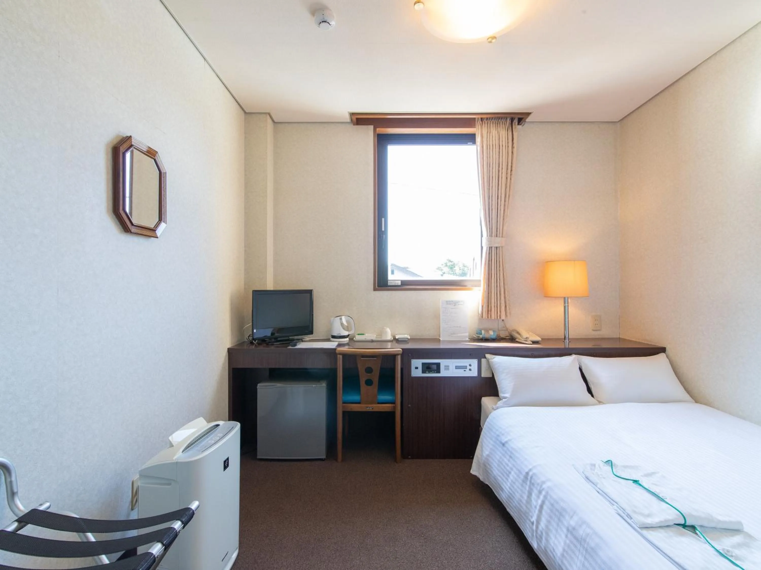 Photo of the whole room, Bed in Tabist Business Hotel Fujiya