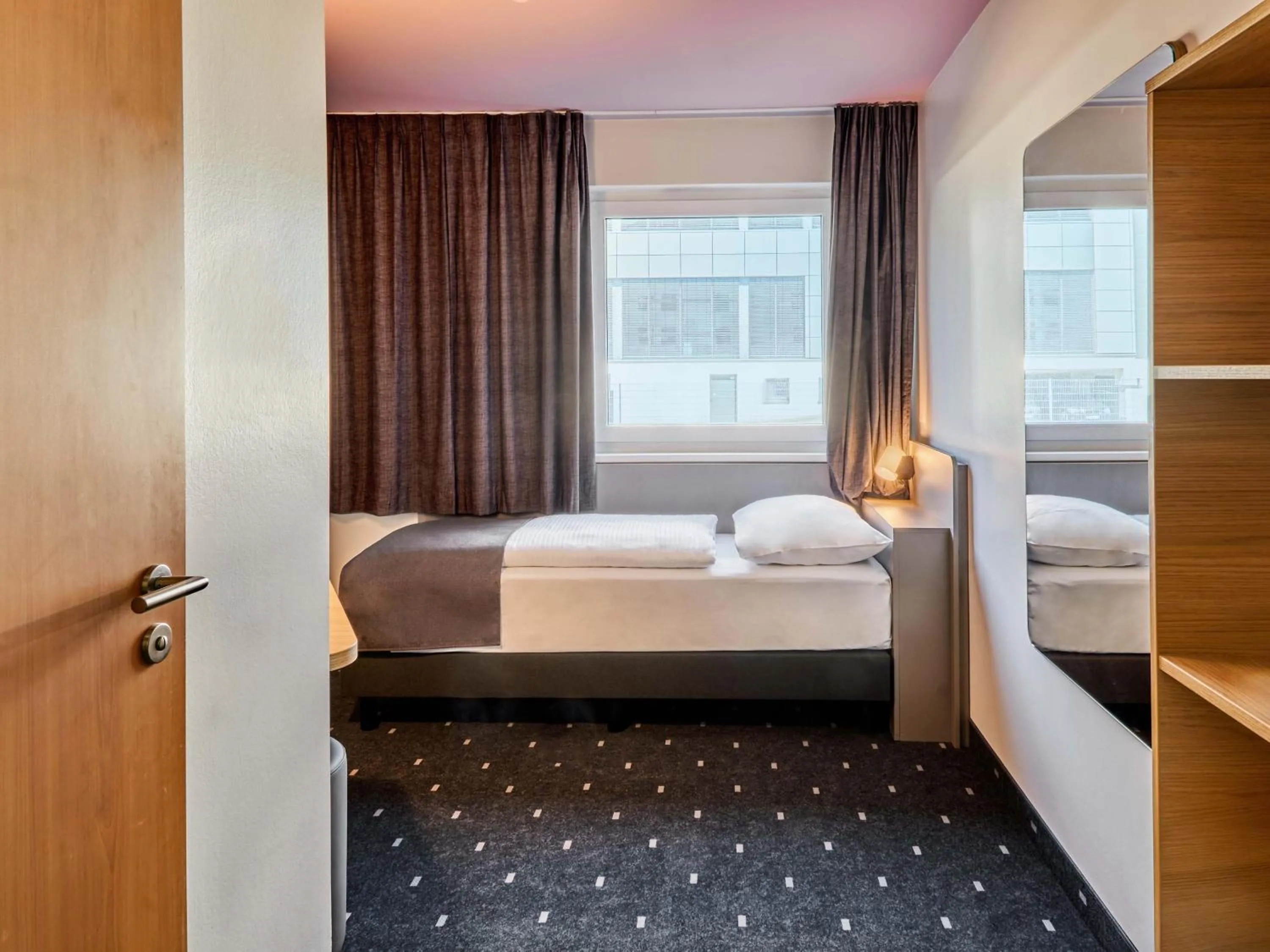 Photo of the whole room, Bed in B&B HOTEL Frankfurt-Niederrad