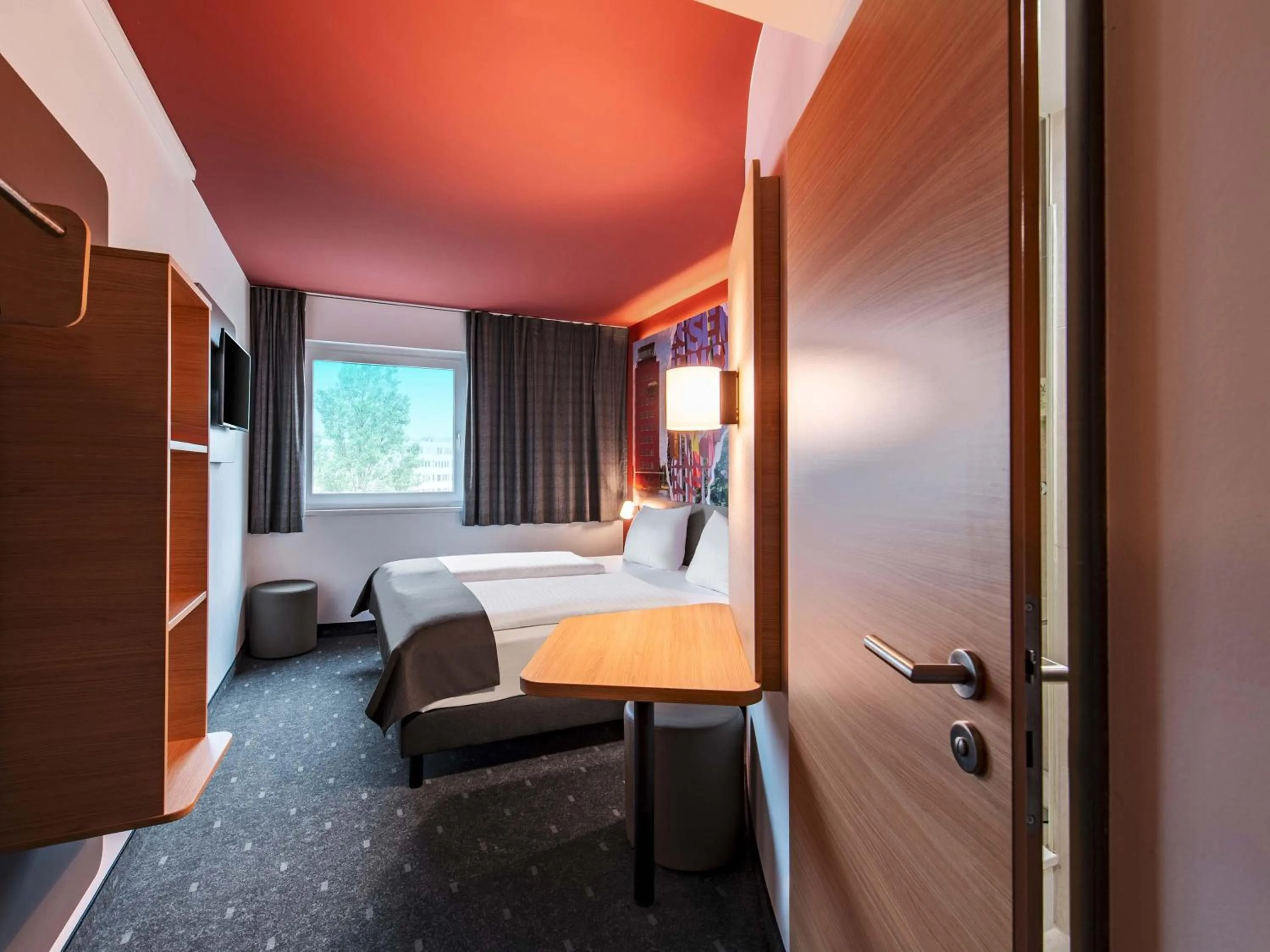 Photo of the whole room, Bed in B&B HOTEL München-Messe