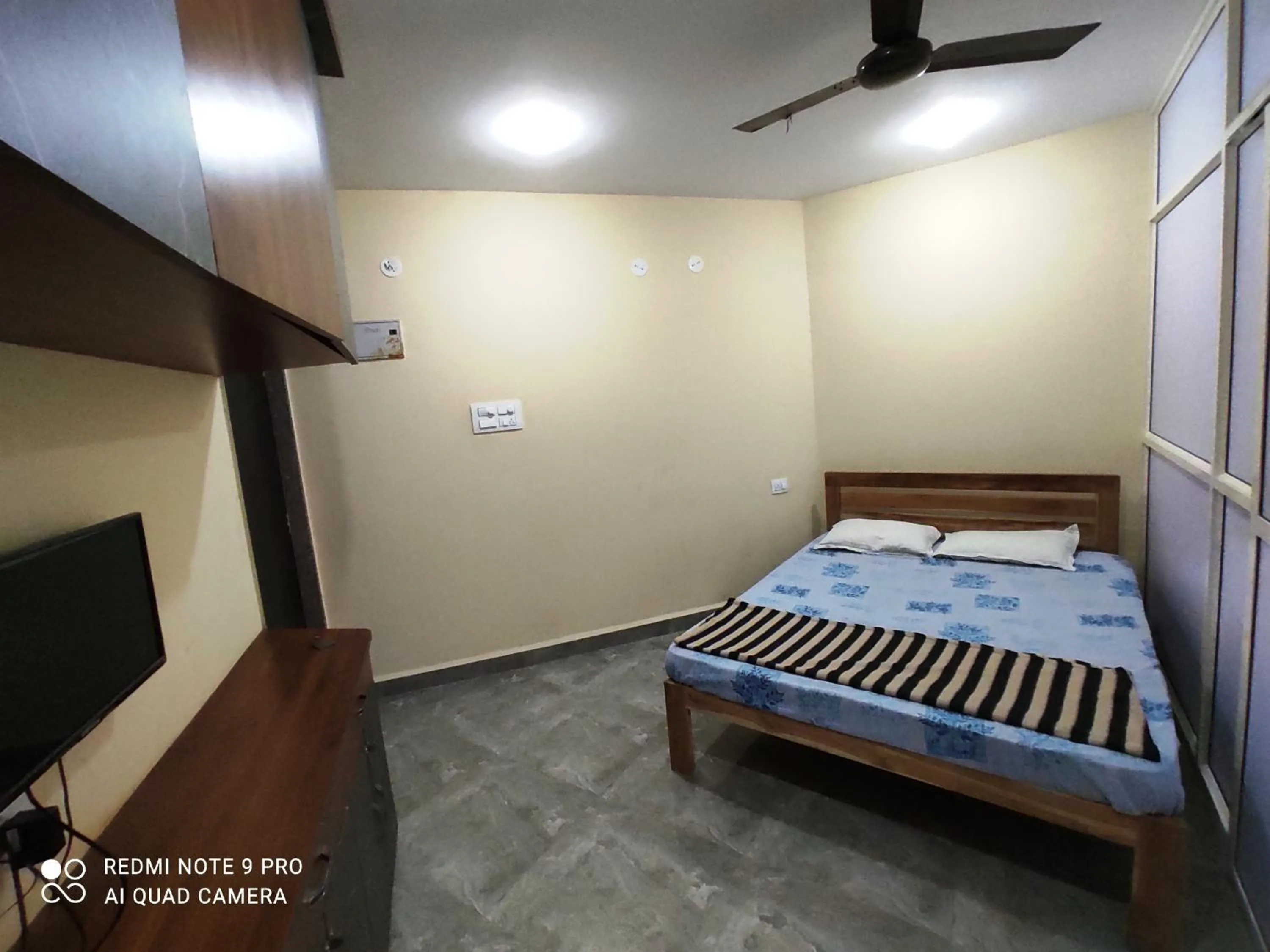 Bed in Godwill Kimo Guest house Seraulim