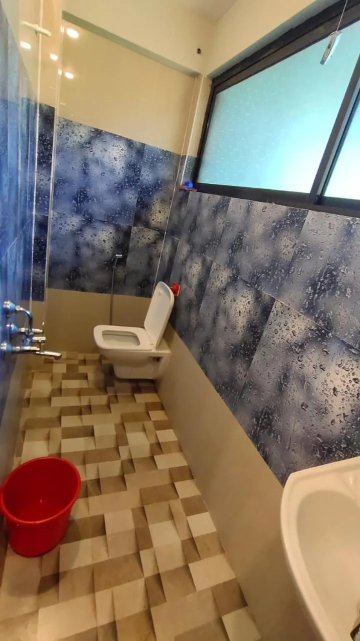 Shower in Godwill Kimo Guest house Seraulim
