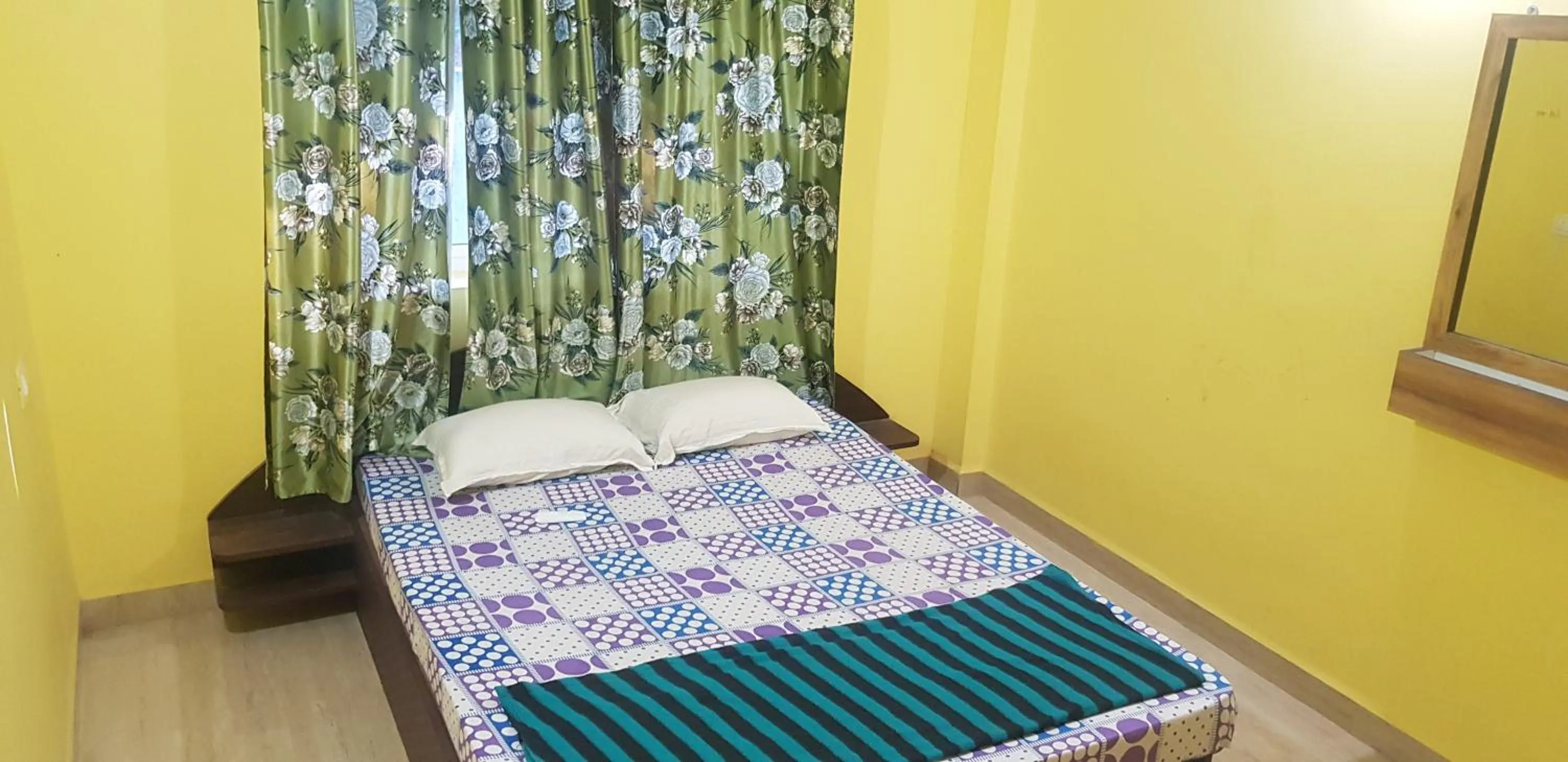 Bed in Godwill Kimo Guest house Seraulim