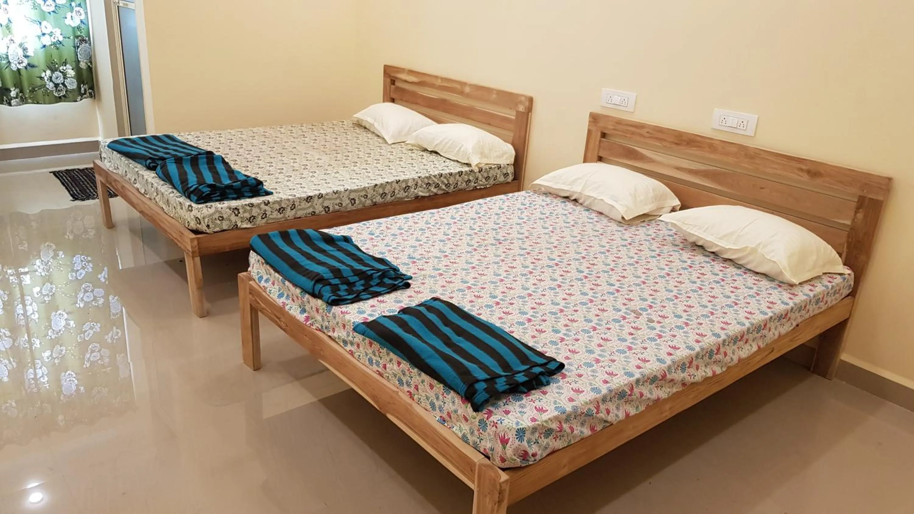 Bed in Godwill Kimo Guest house Seraulim