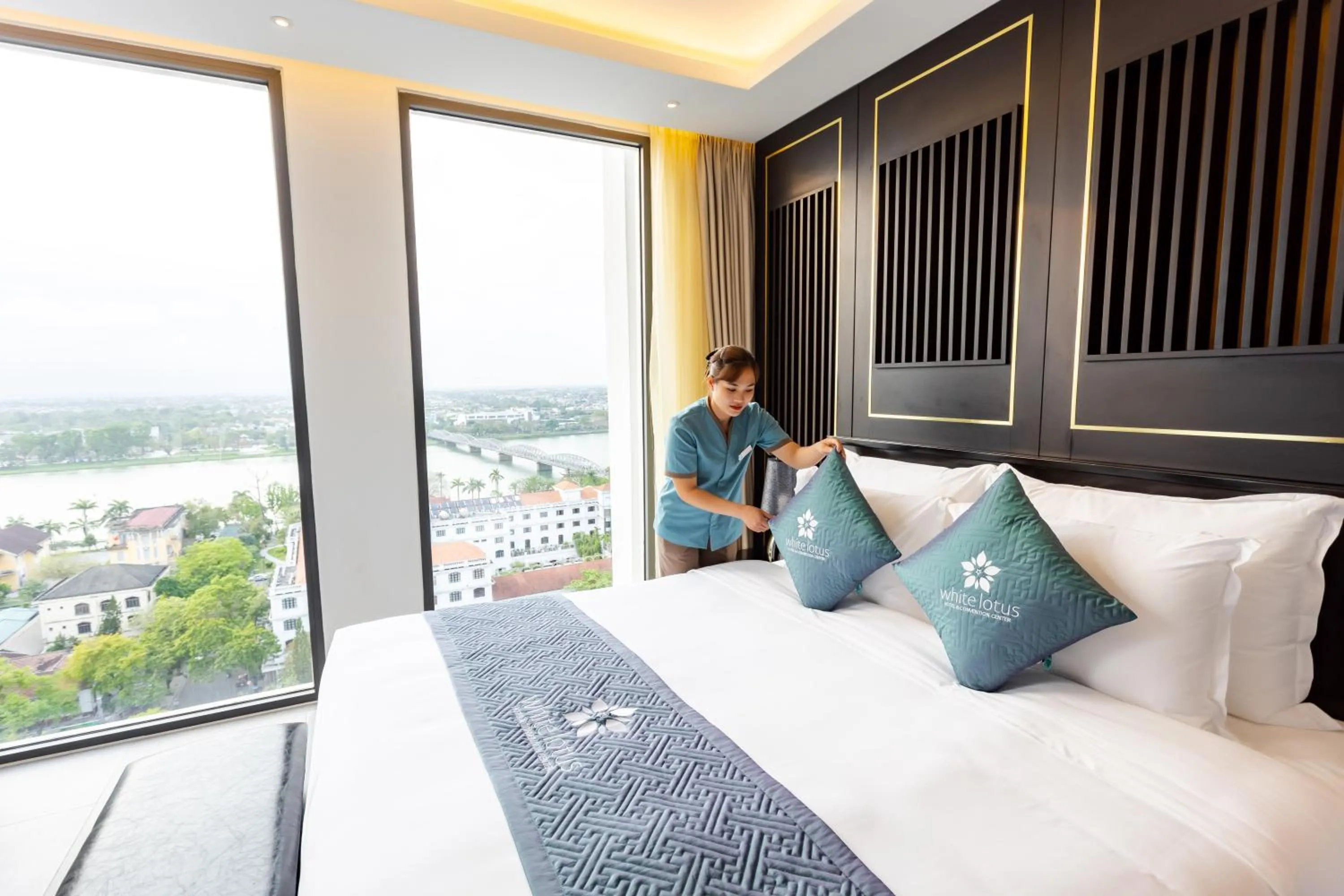 Photo of the whole room, Bed in White Lotus Hue Hotel