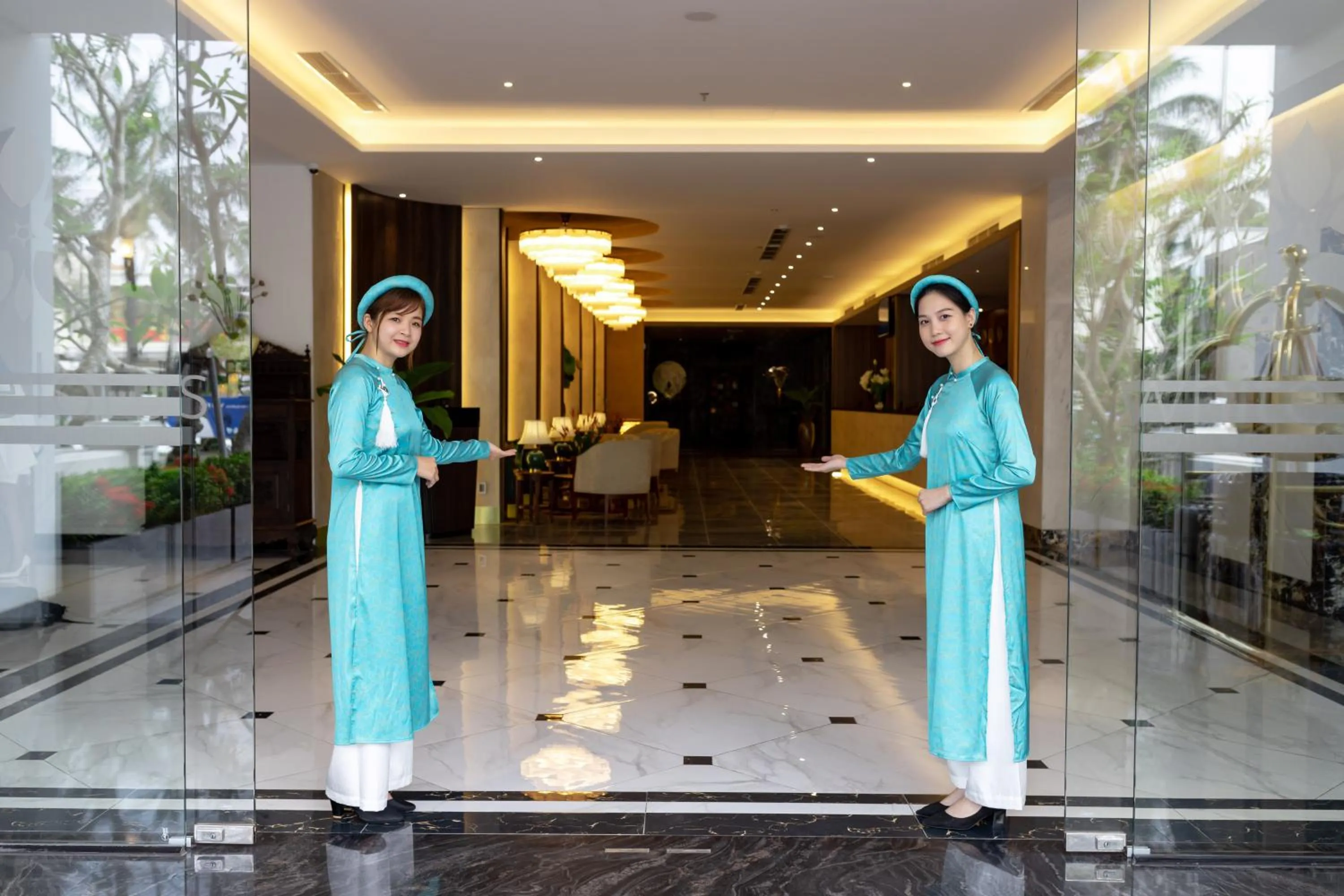Staff in White Lotus Hue Hotel