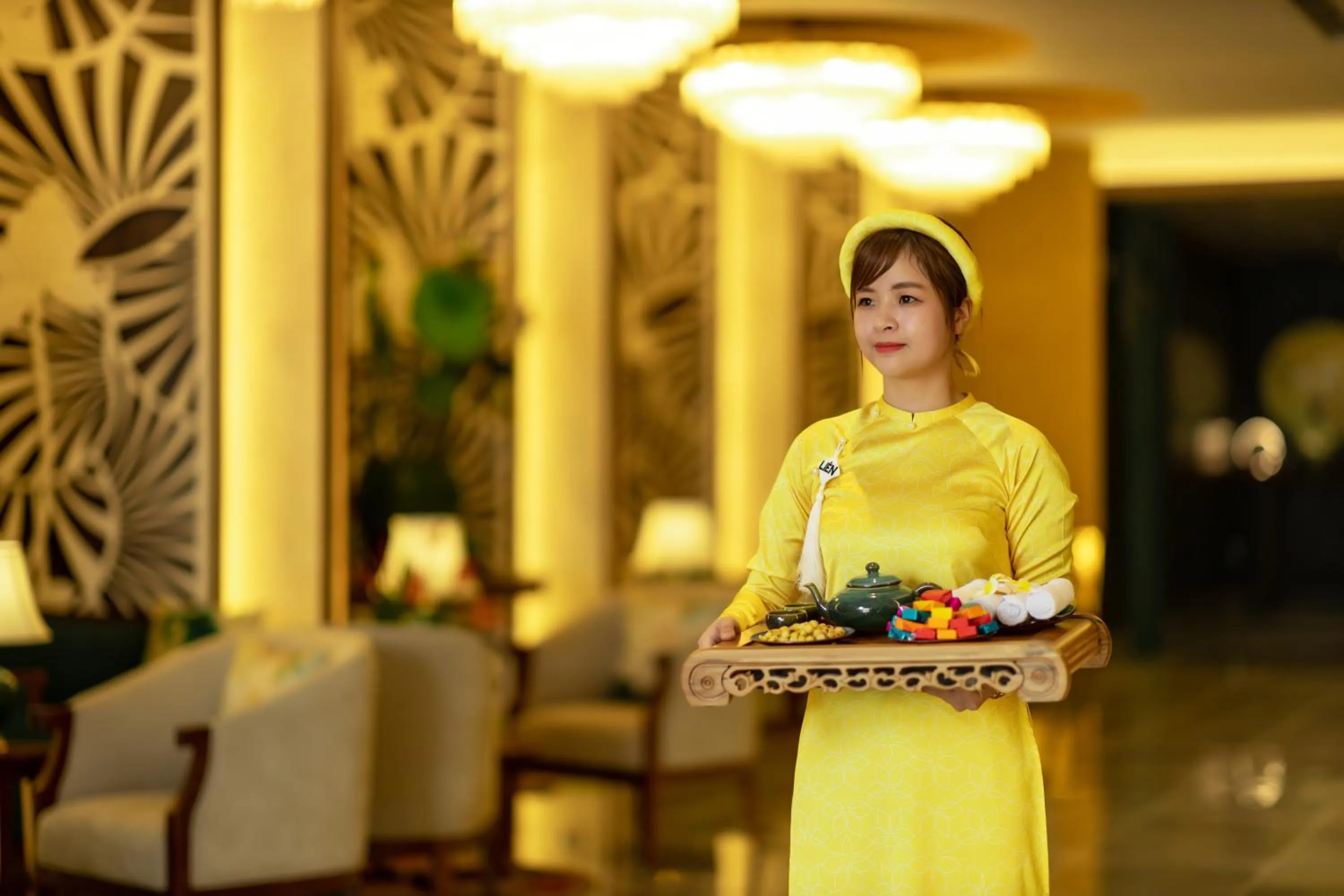 Staff in White Lotus Hue Hotel