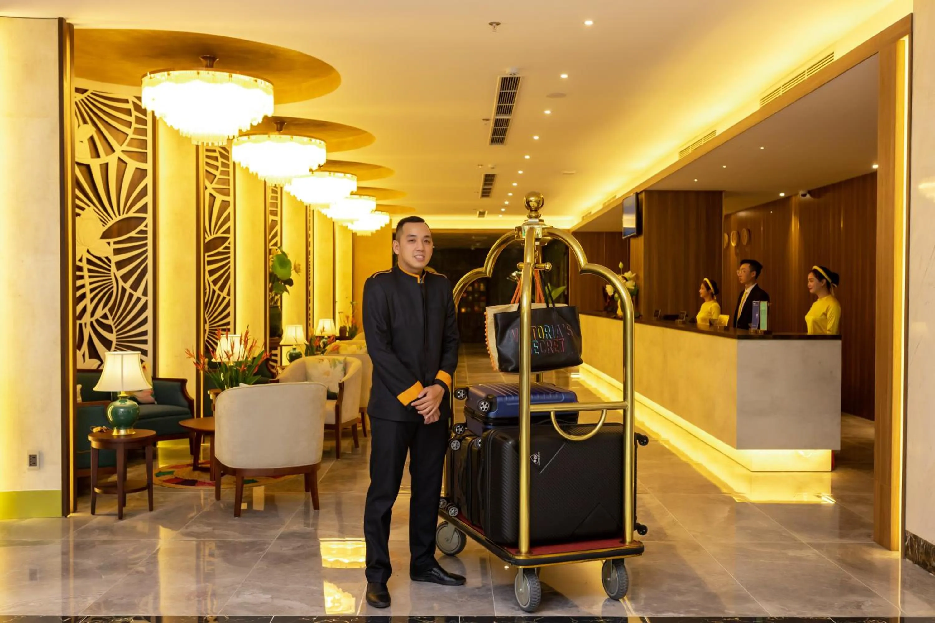 Staff in White Lotus Hue Hotel