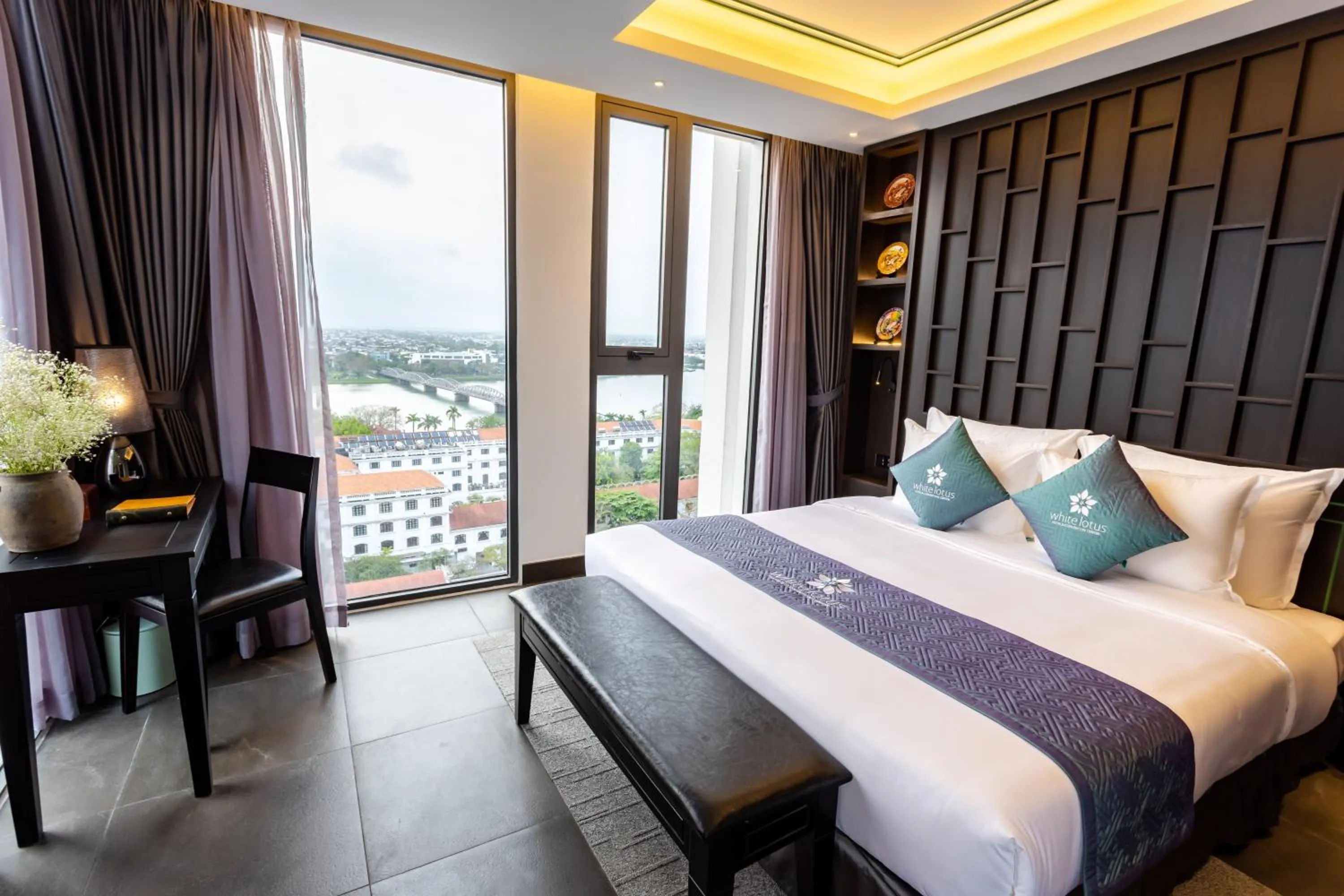 Photo of the whole room, Bed in White Lotus Hue Hotel