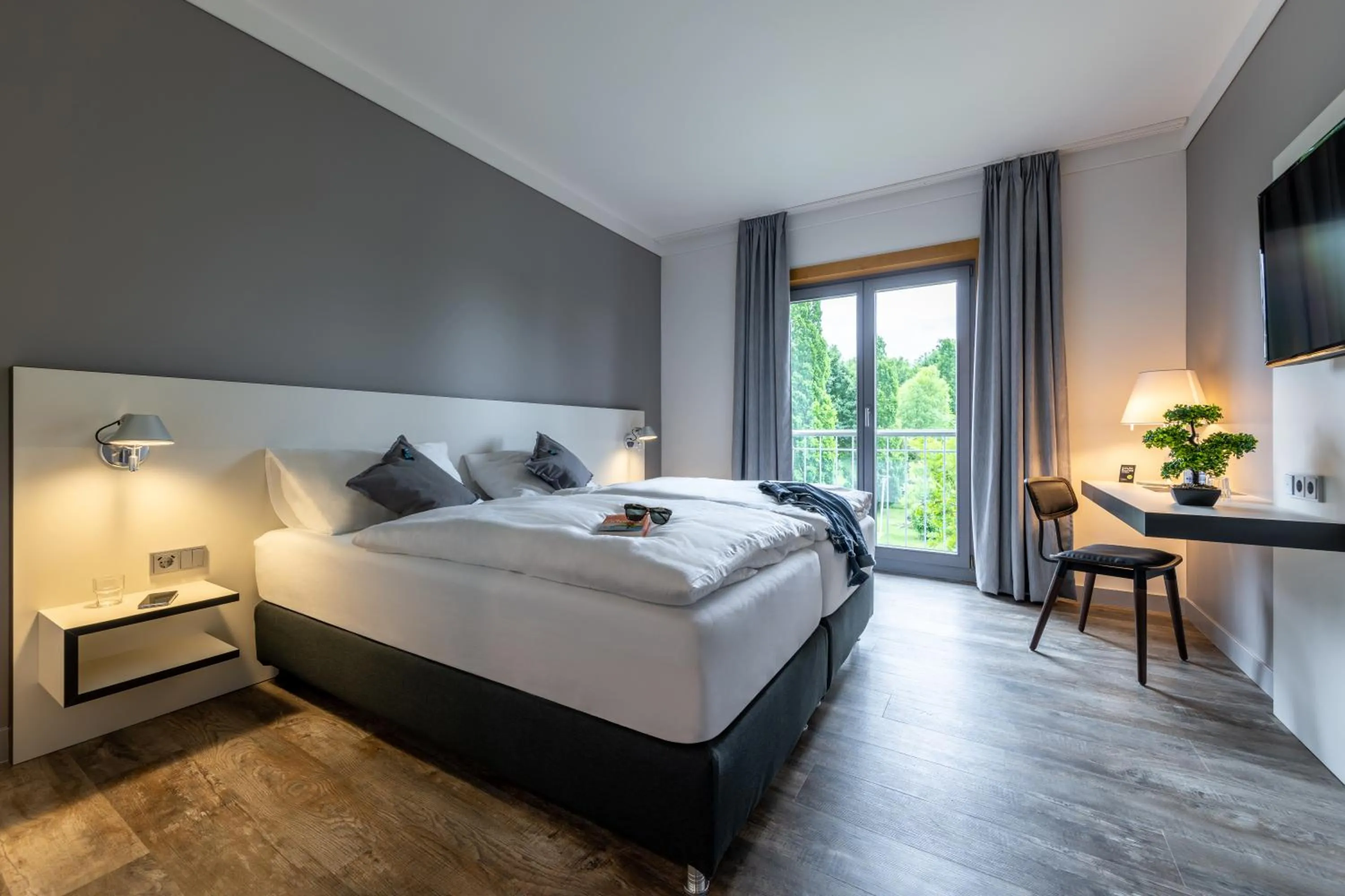 Photo of the whole room, Bed in Hotel Leipheim Süd