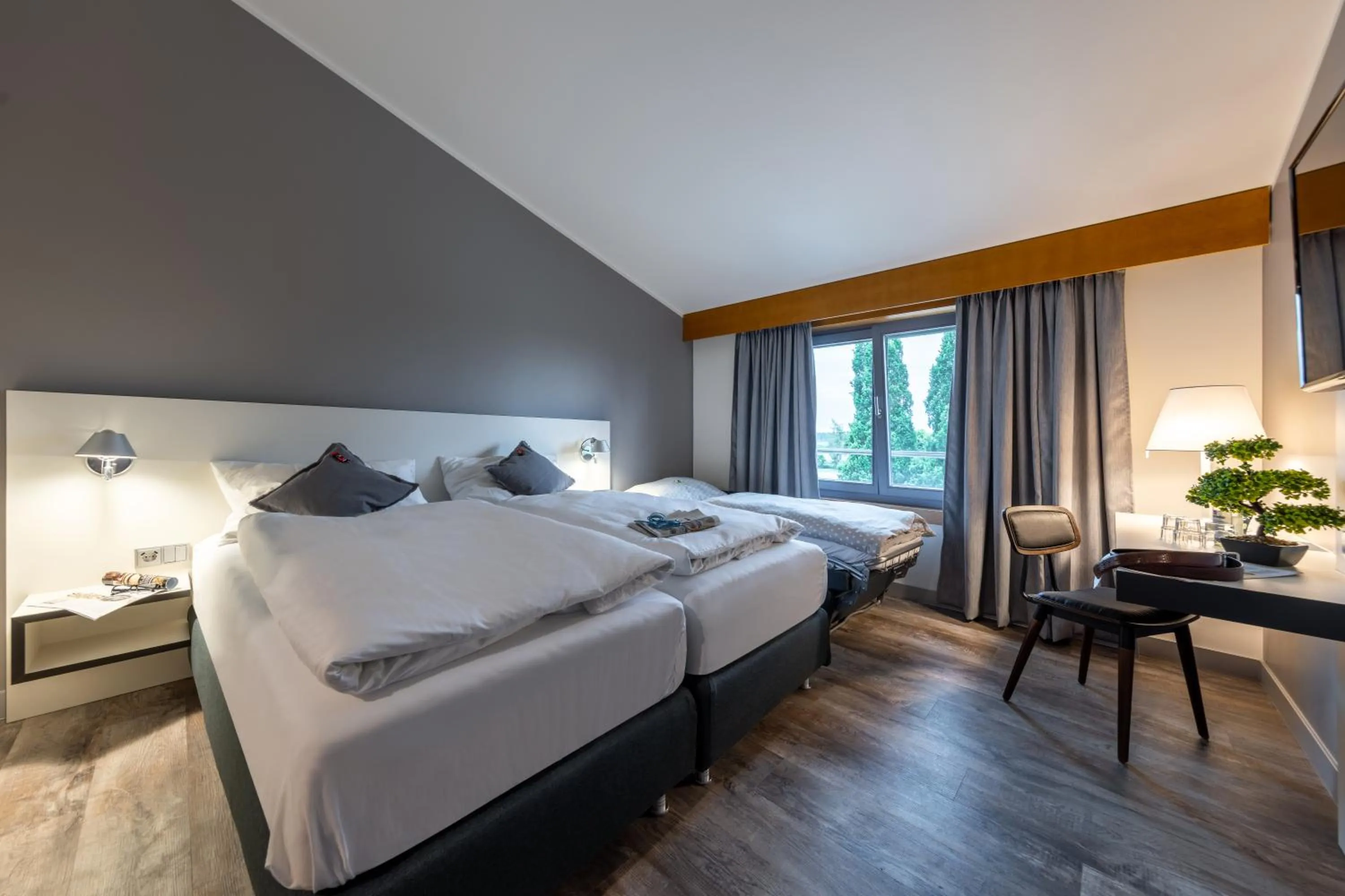 Photo of the whole room, Bed in Hotel Leipheim Süd