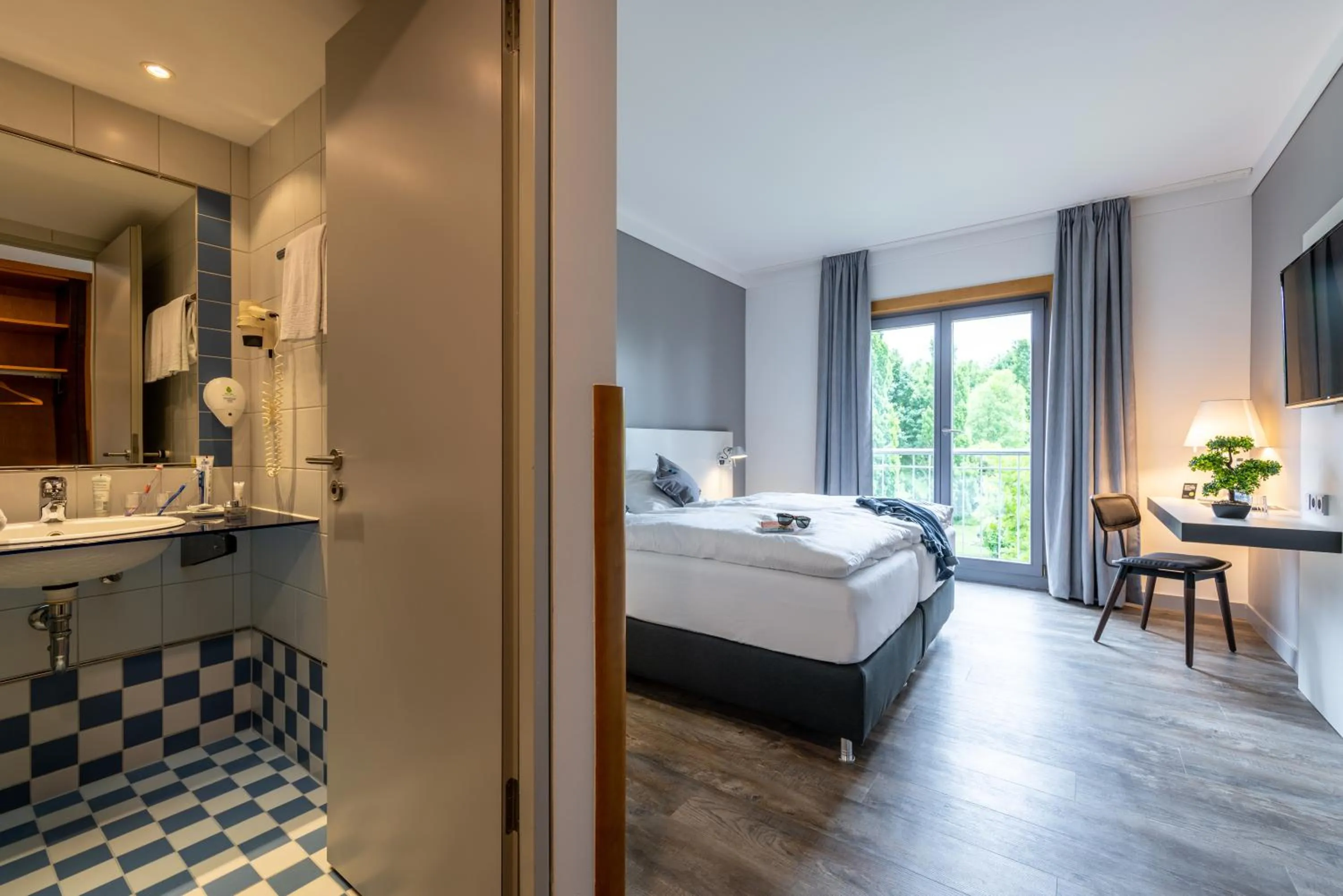 Photo of the whole room, Bed in Hotel Leipheim Süd