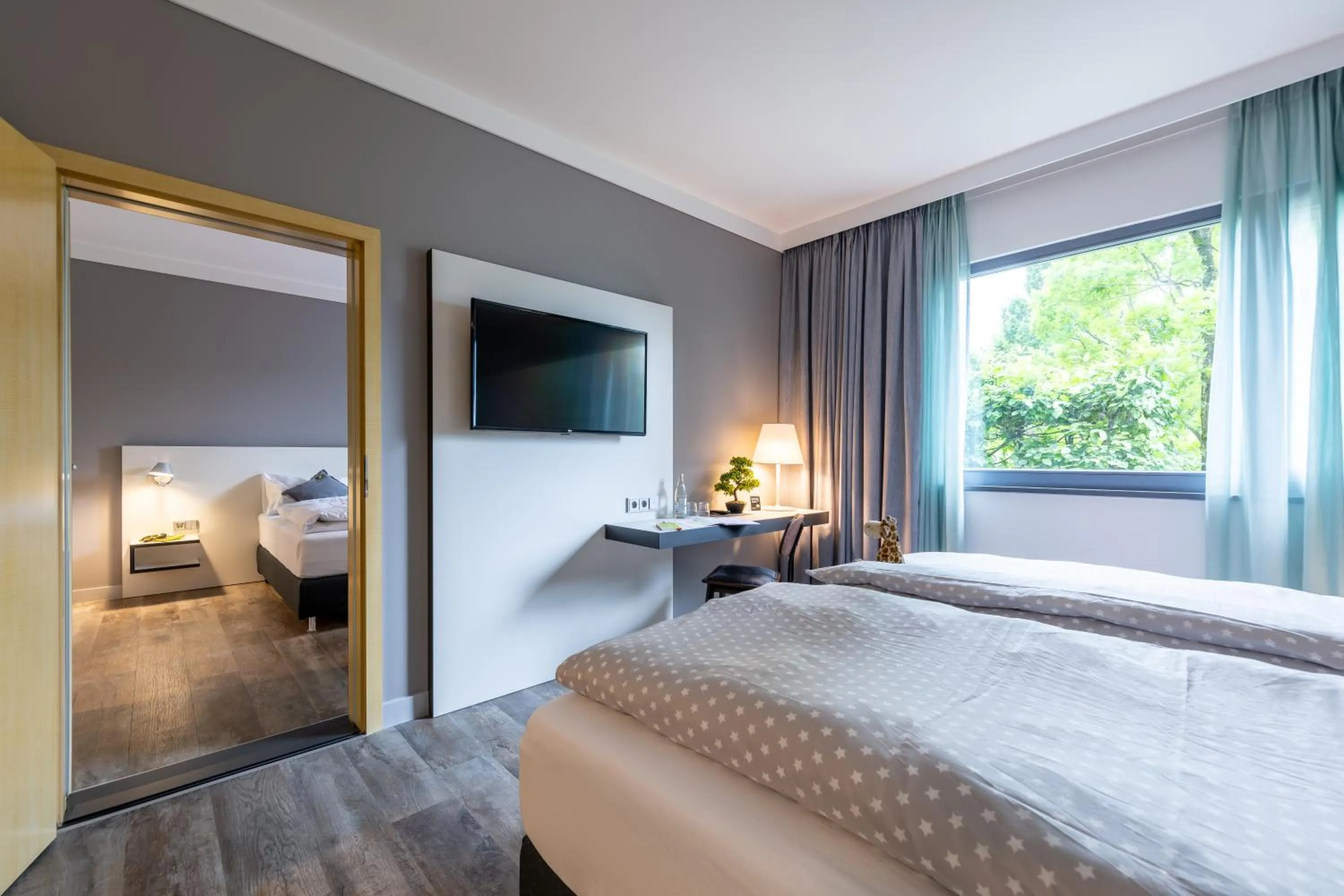 Photo of the whole room, Bed in Hotel Leipheim Süd