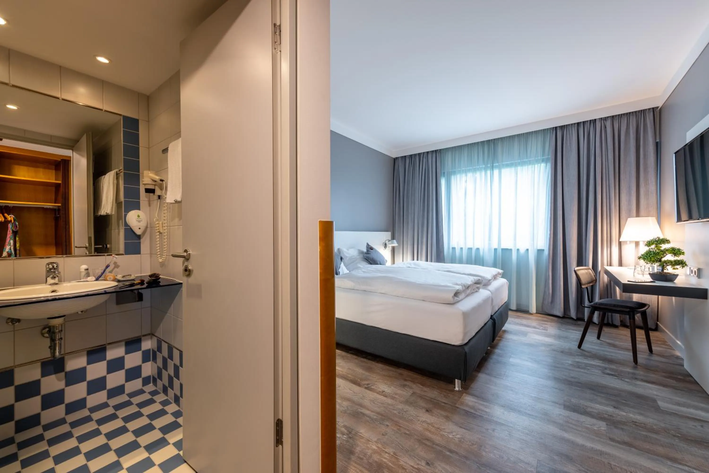 Photo of the whole room, Bed in Hotel Leipheim Süd