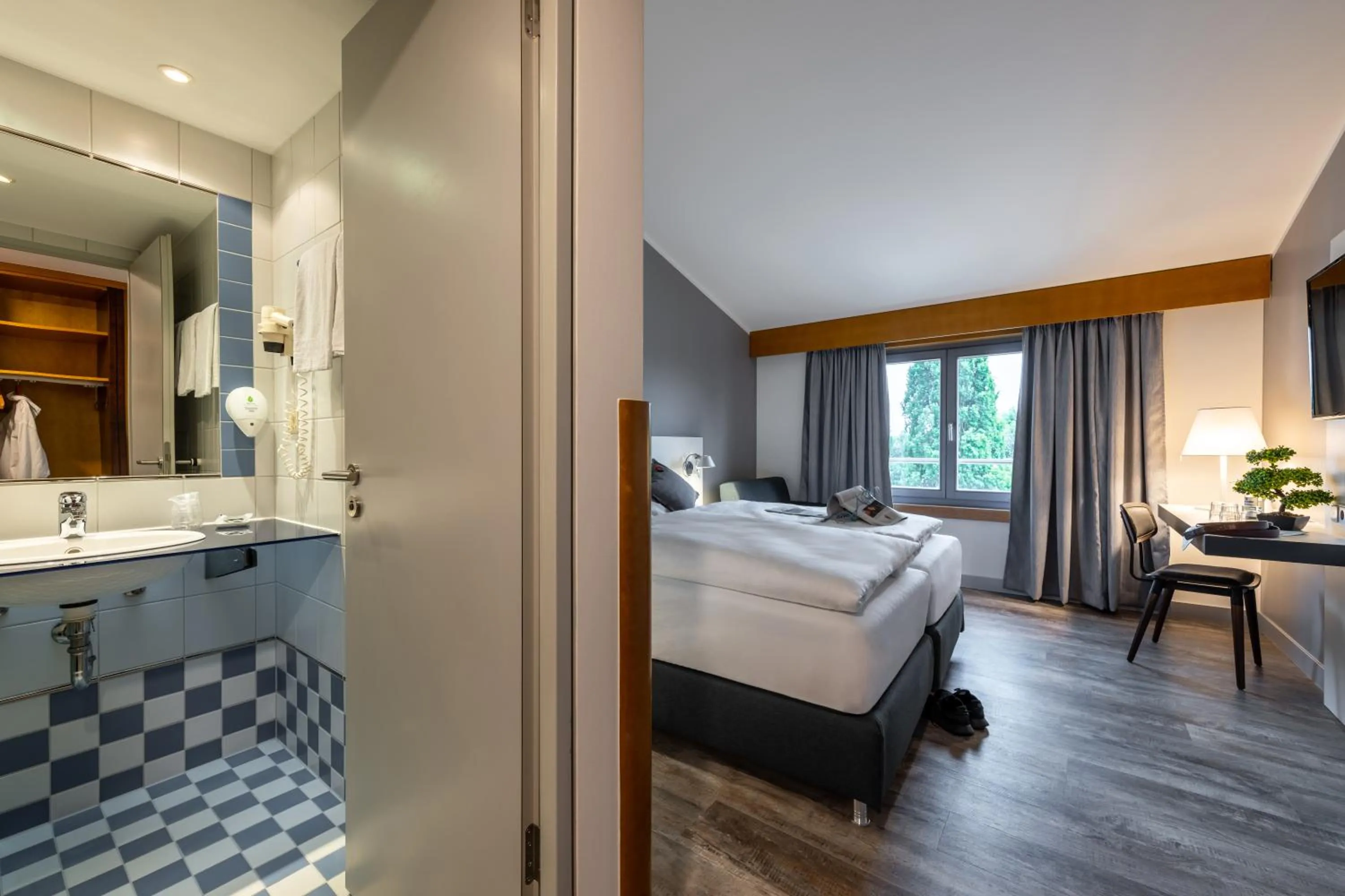 Photo of the whole room, Bed in Hotel Leipheim Süd