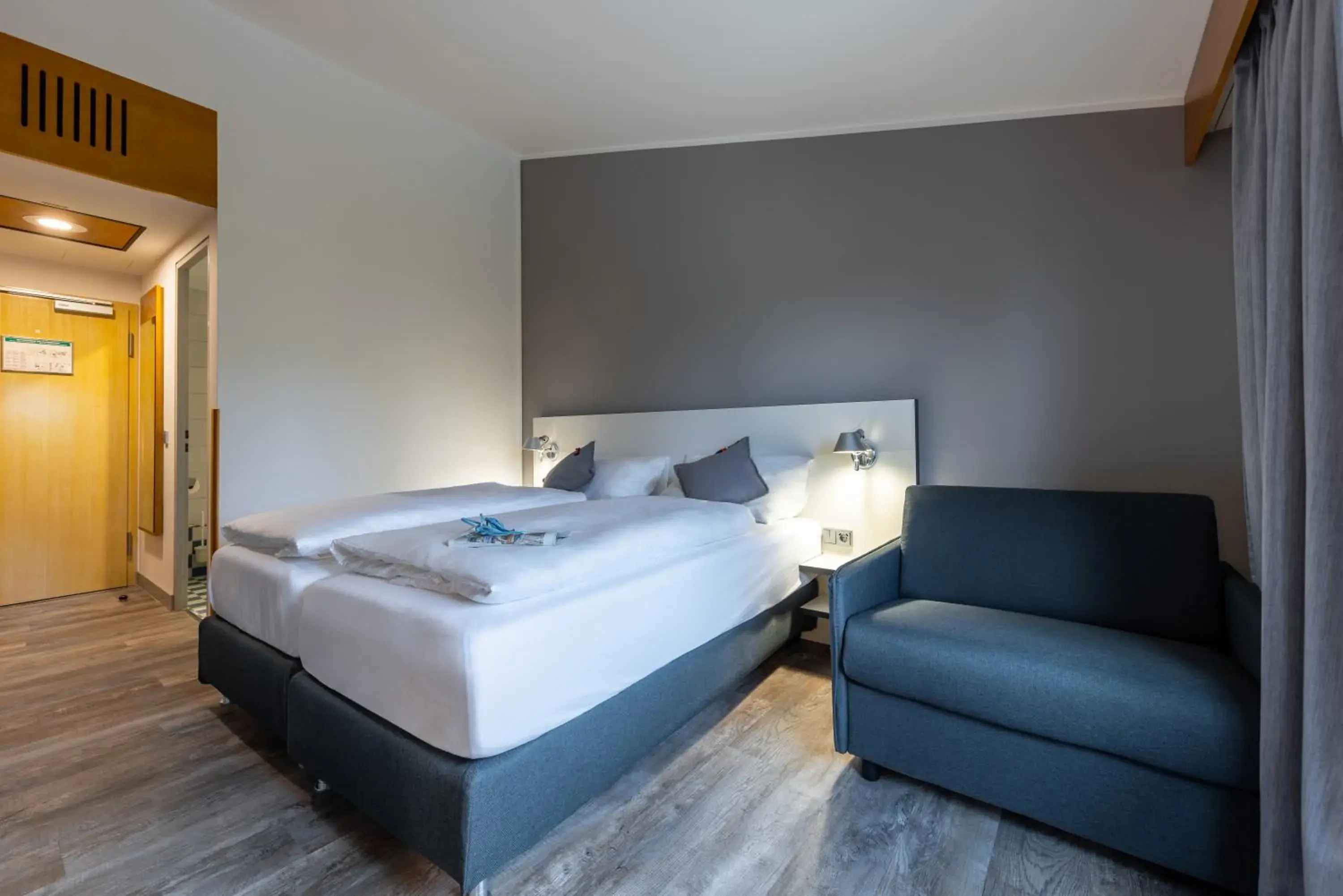 Photo of the whole room, Bed in Hotel Leipheim Süd Photo of the whole room, Bed in Hotel Leipheim Süd