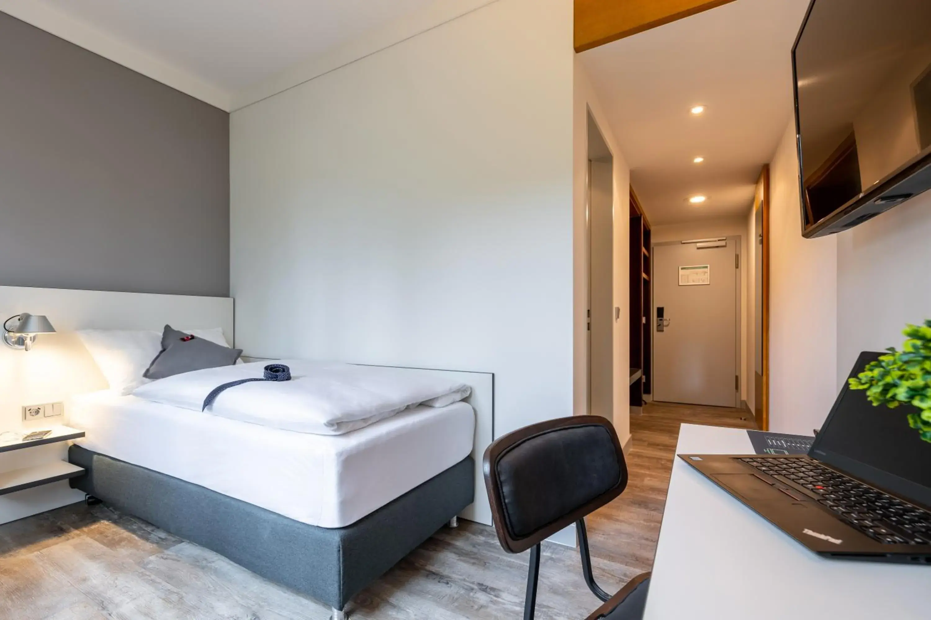 Photo of the whole room, Bed in Hotel Leipheim Süd Photo of the whole room, Bed in Hotel Leipheim Süd