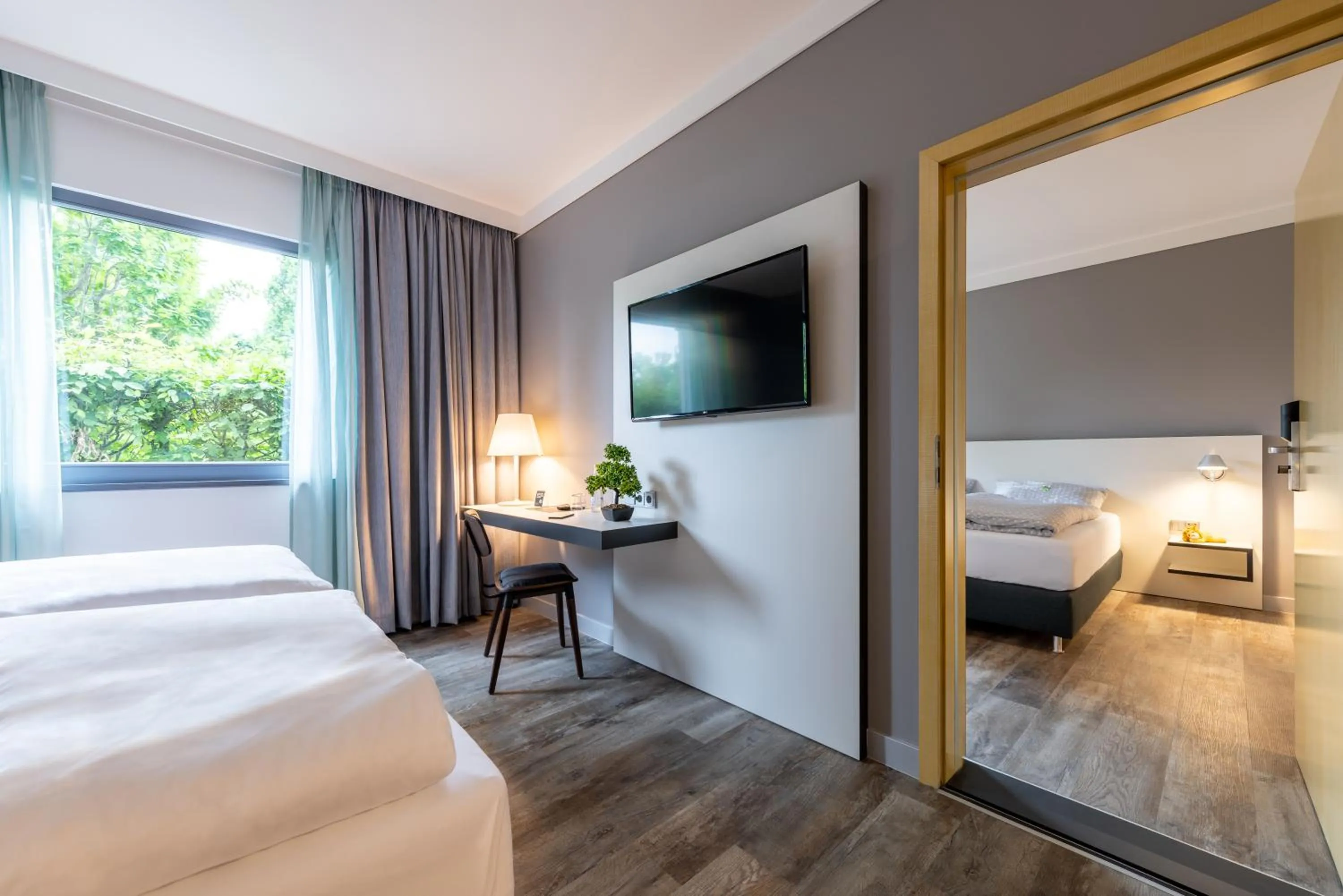 Photo of the whole room, Bed in Hotel Leipheim Süd