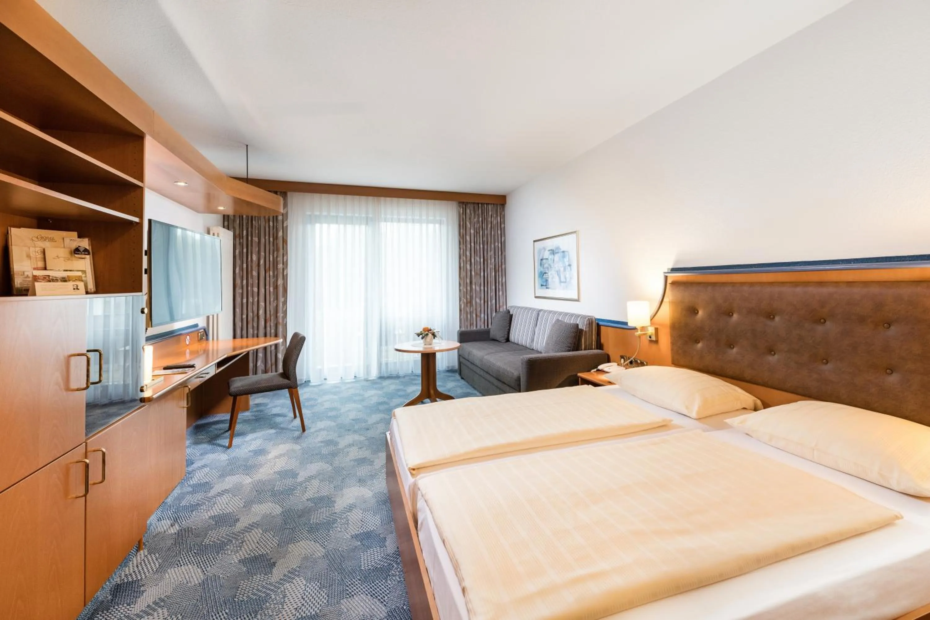 Photo of the whole room, Bed in Posthotel Rotenburg