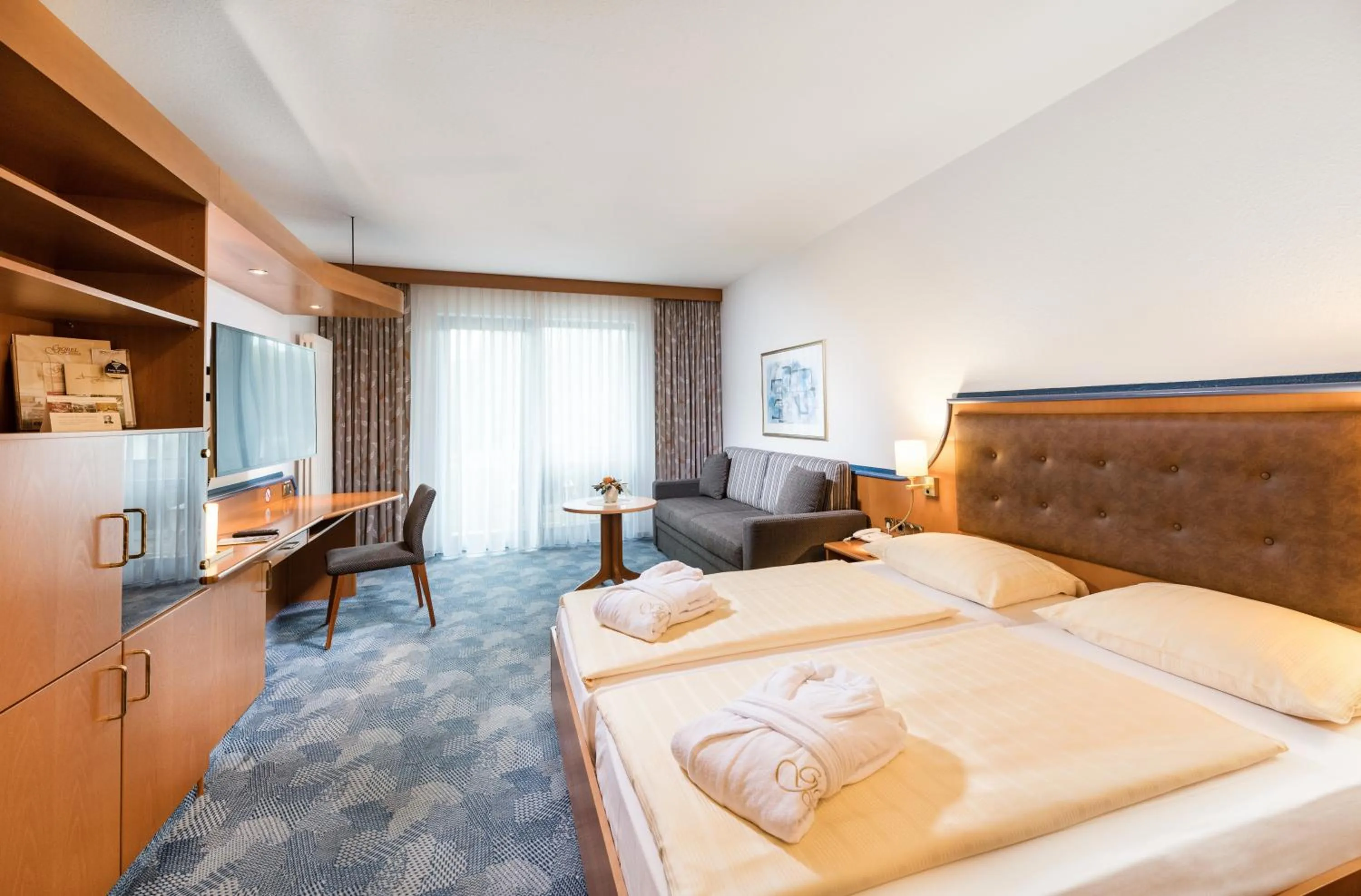 Photo of the whole room, Bed in Posthotel Rotenburg