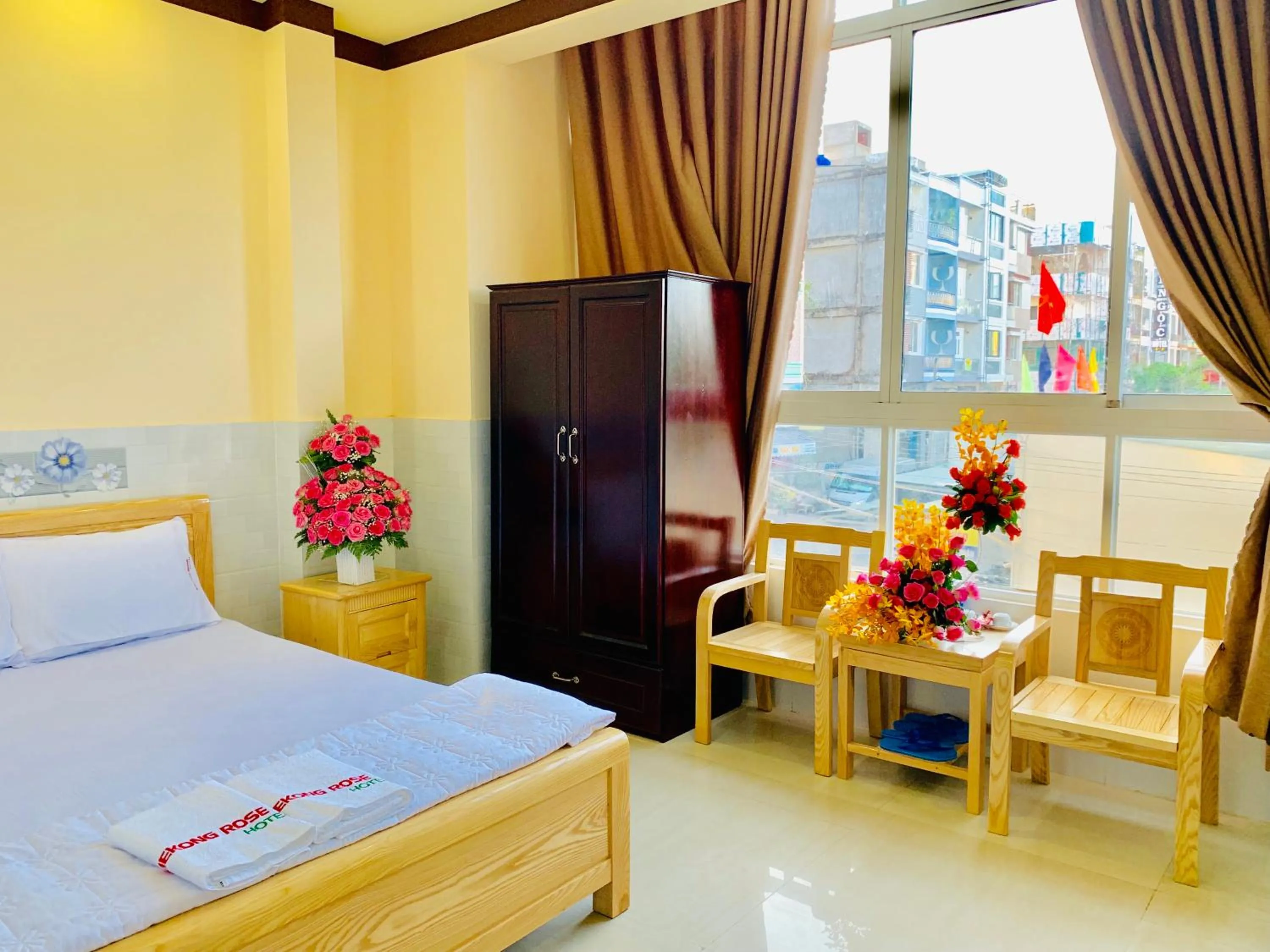 Bed in Mekong Rose Hotel