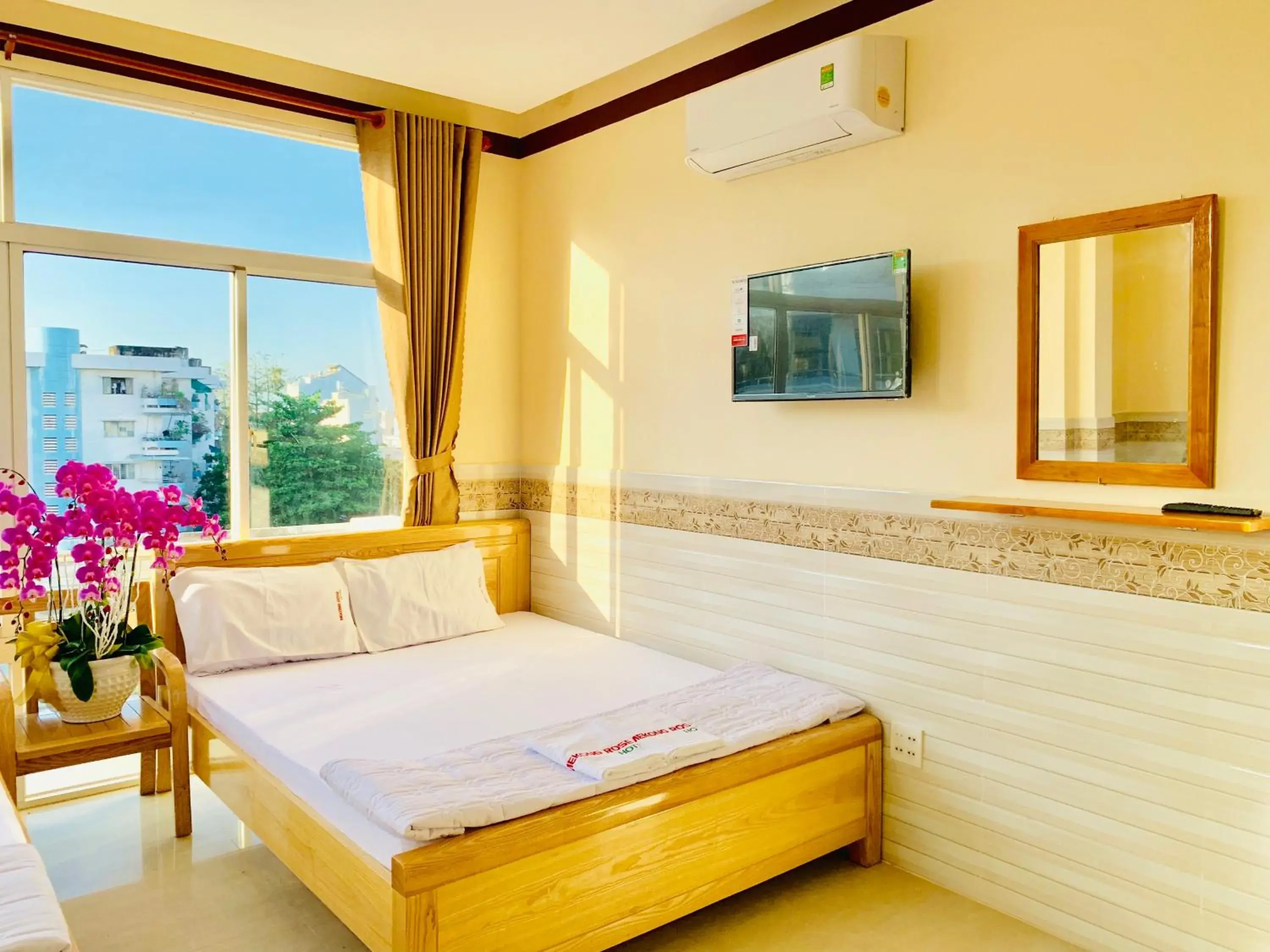 Bed in Mekong Rose Hotel Bed in Mekong Rose Hotel