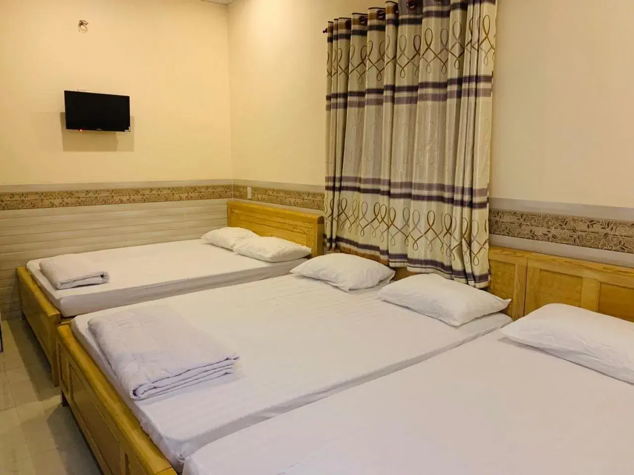 Bed in Mekong Rose Hotel Bed in Mekong Rose Hotel