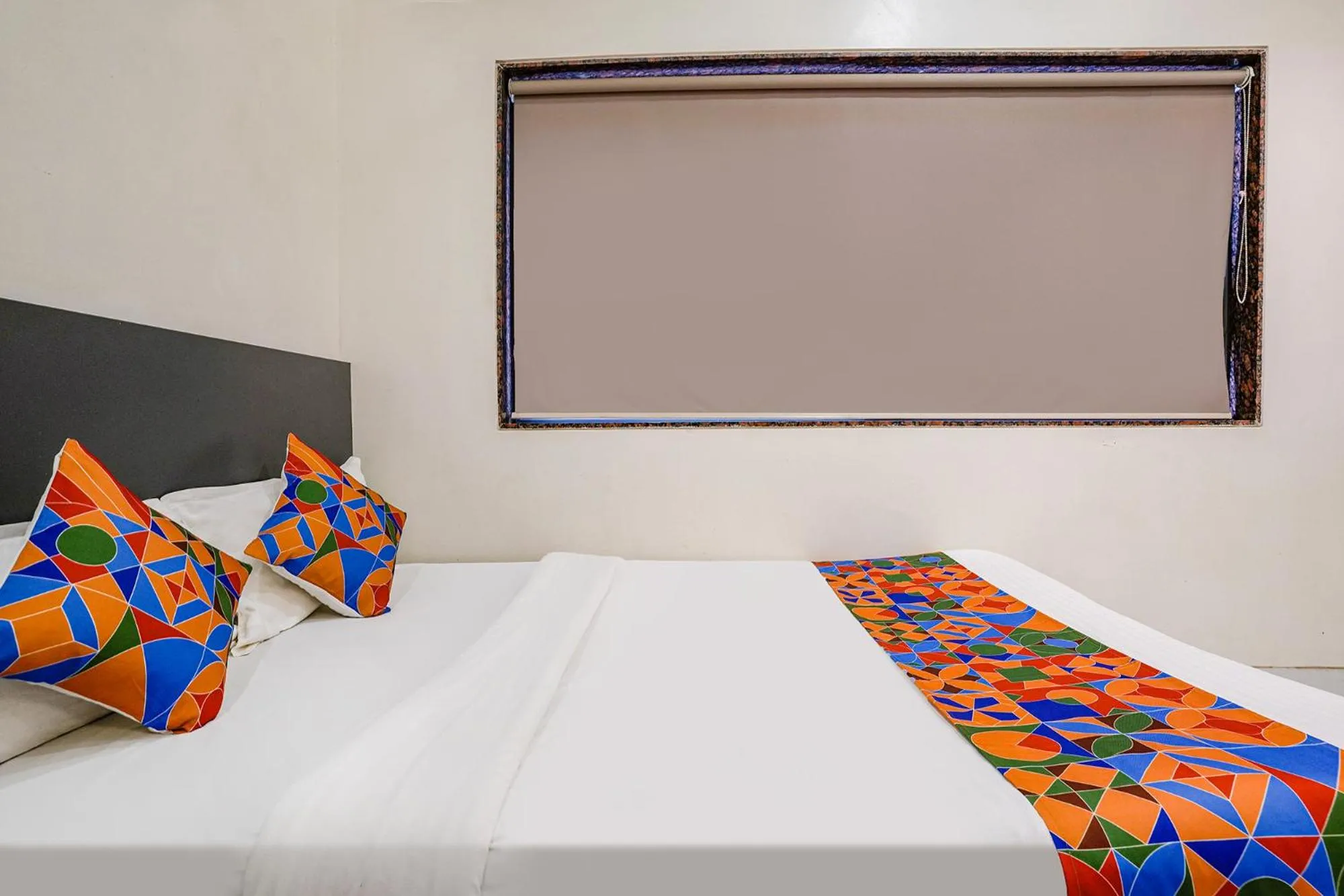 Bed in FabHotel Ansh