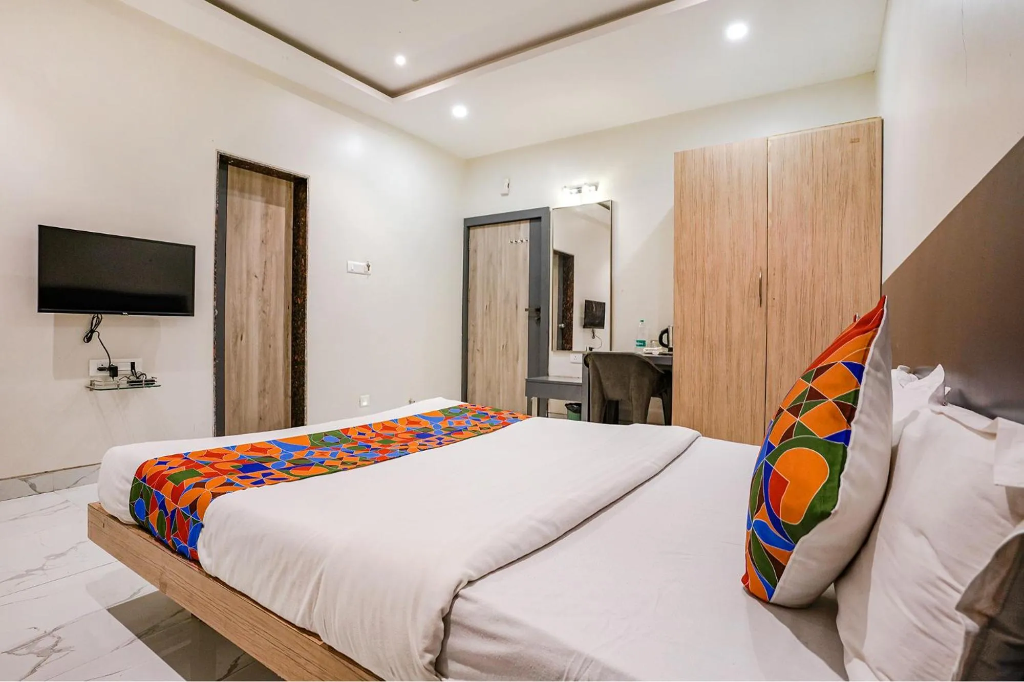 Bed in FabHotel Ansh