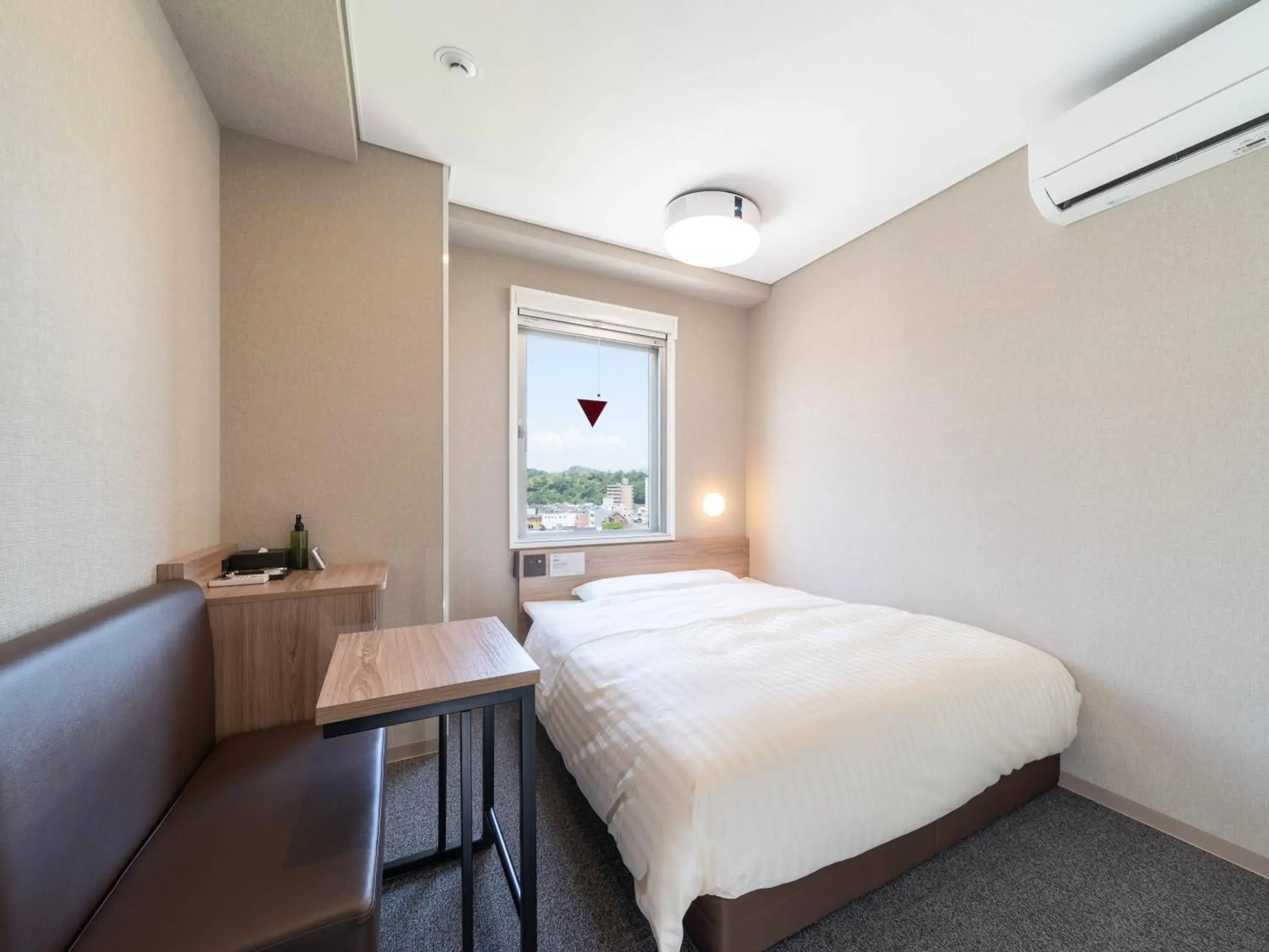 Bed in Super Hotel Higashi-Maizuru Bed in Super Hotel Higashi-Maizuru