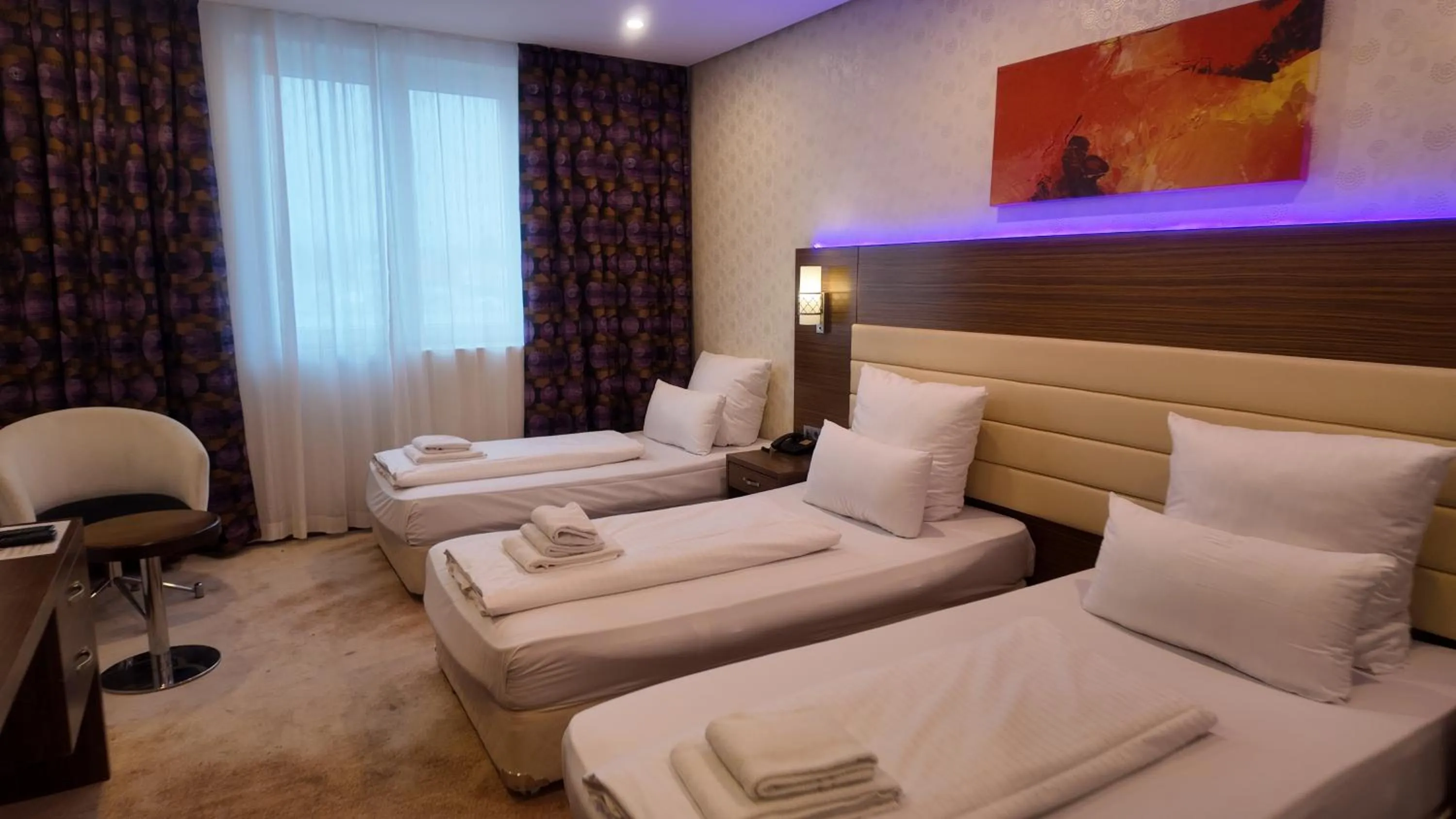 Photo of the whole room in Airport Global Hotel