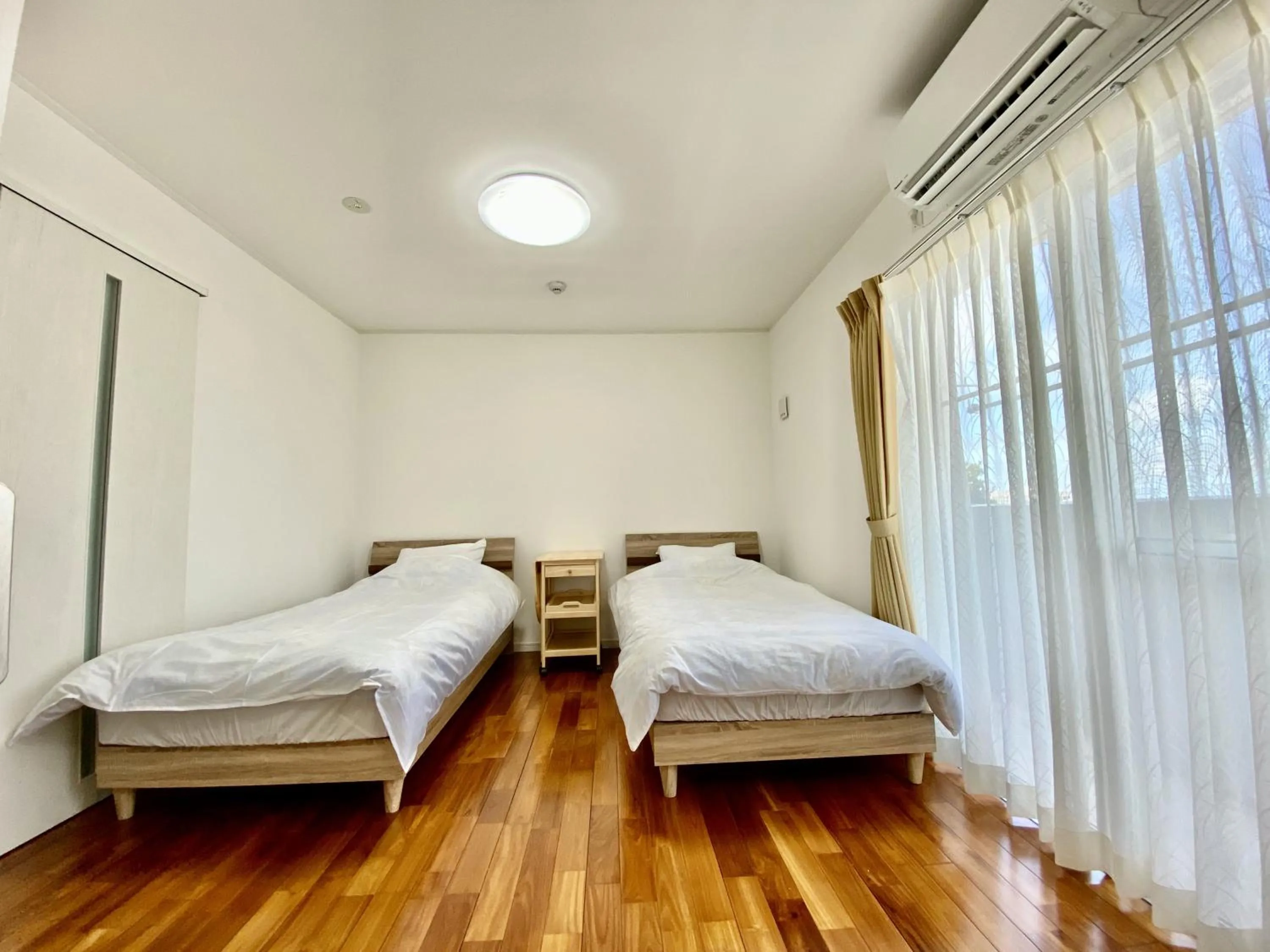 Bed in M-Villaggio Miyakojima