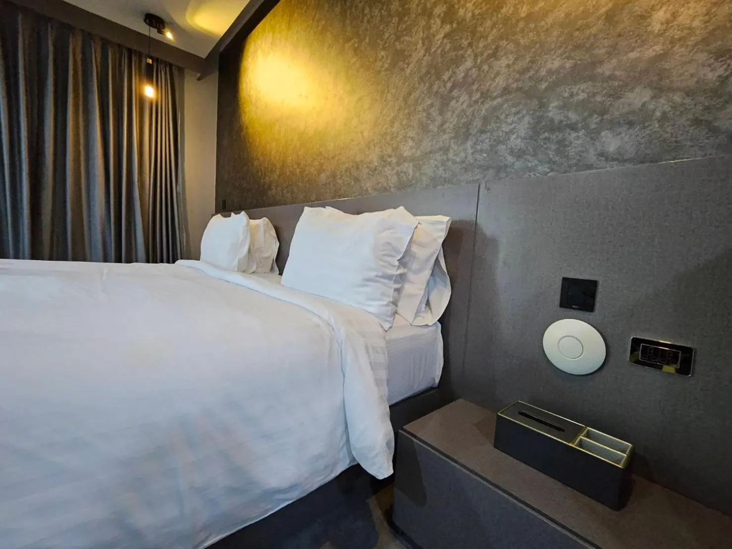 Bed in Little Loft Hotel