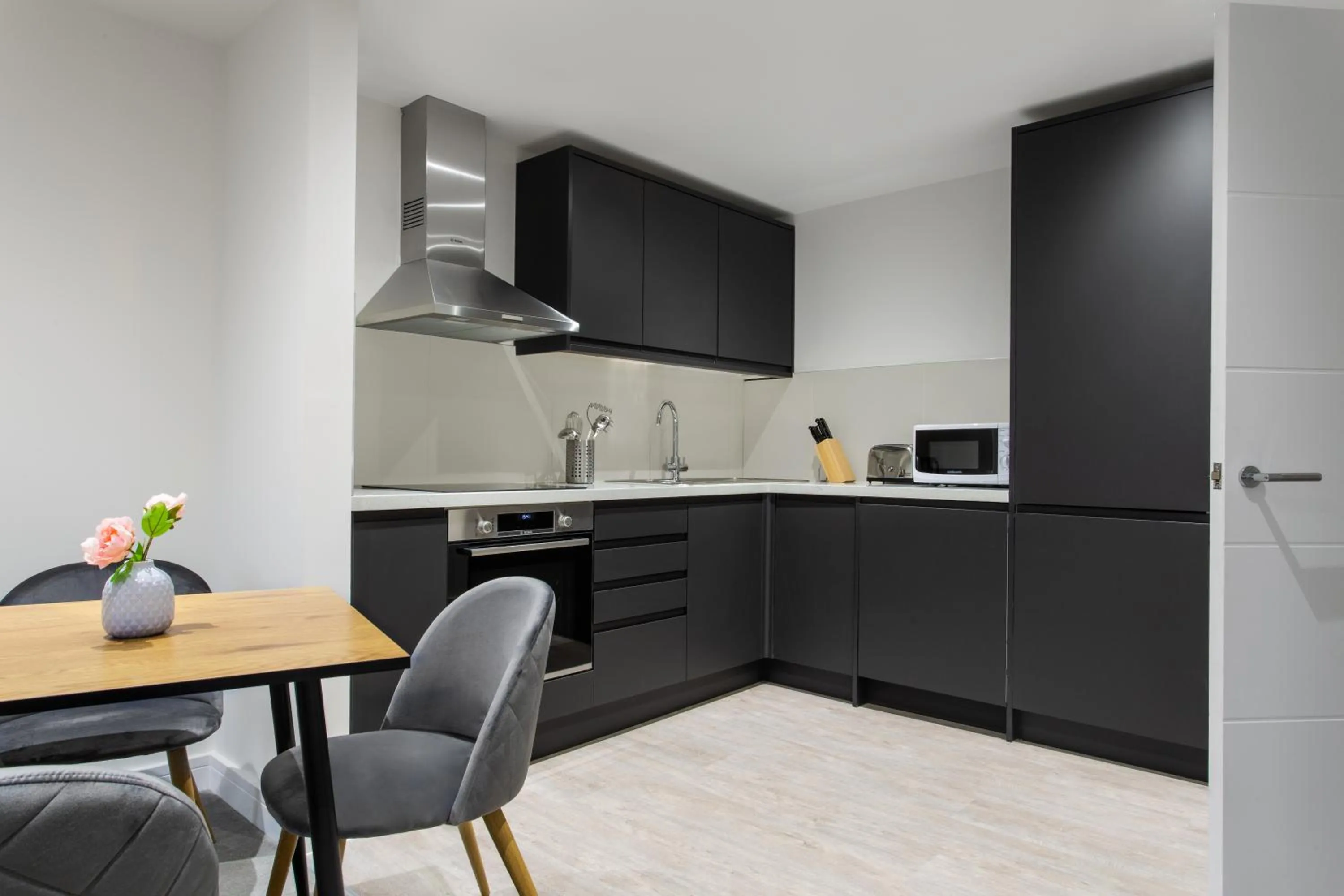 Kitchen or kitchenette in Queens Park by Viridian Apartments