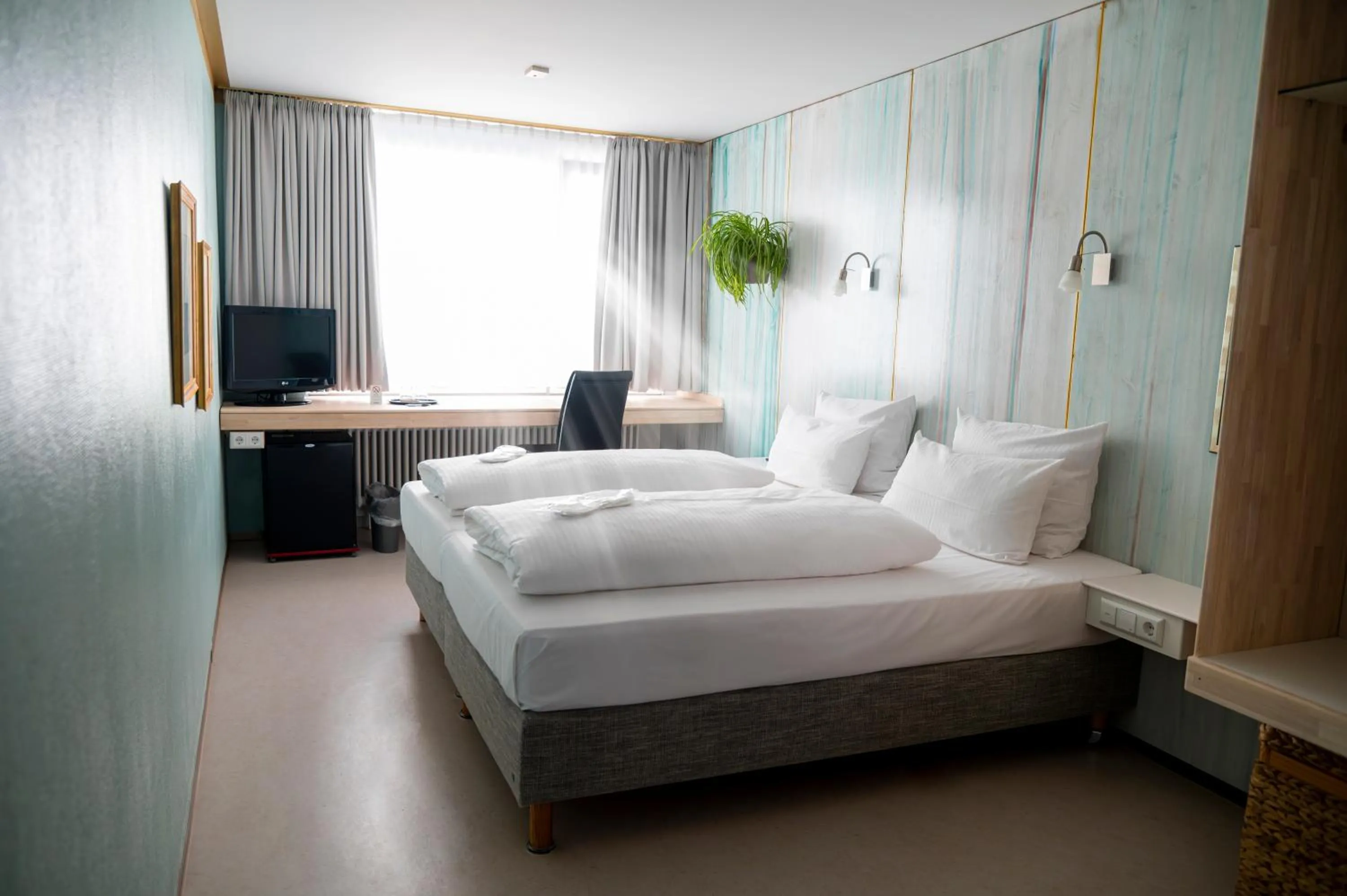 Bed in Abalon Hotel ideal